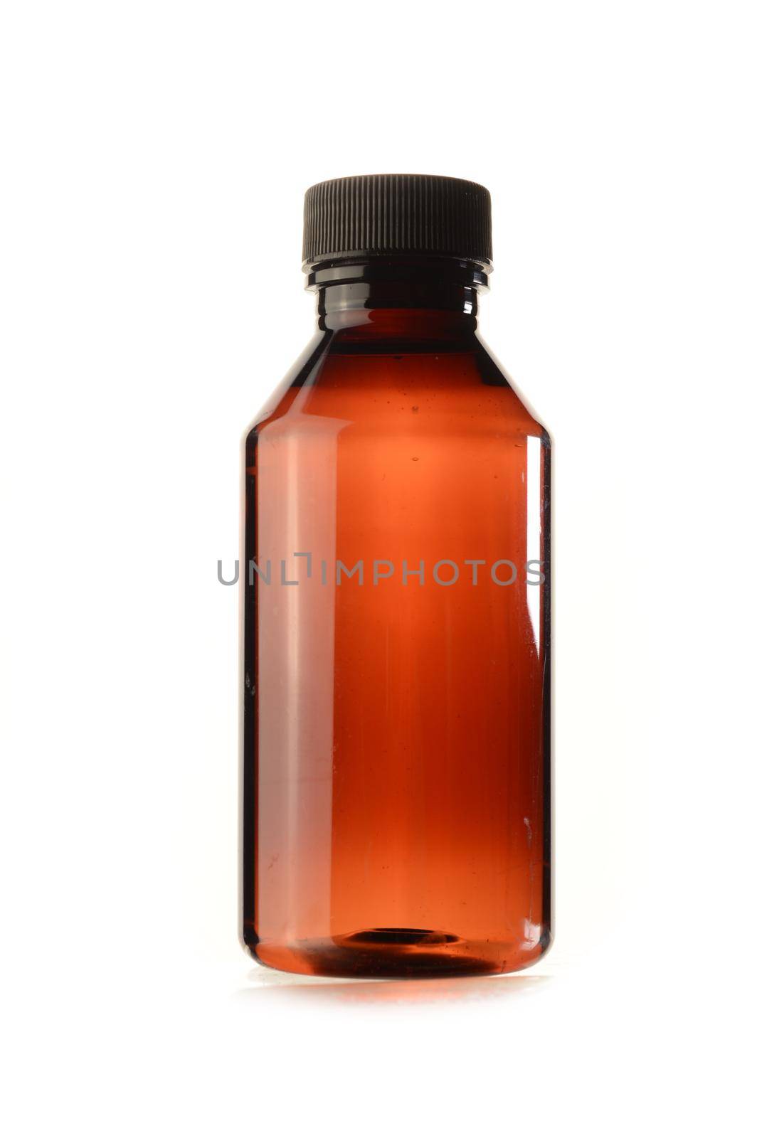 An isolated medicine bottle over a white background.