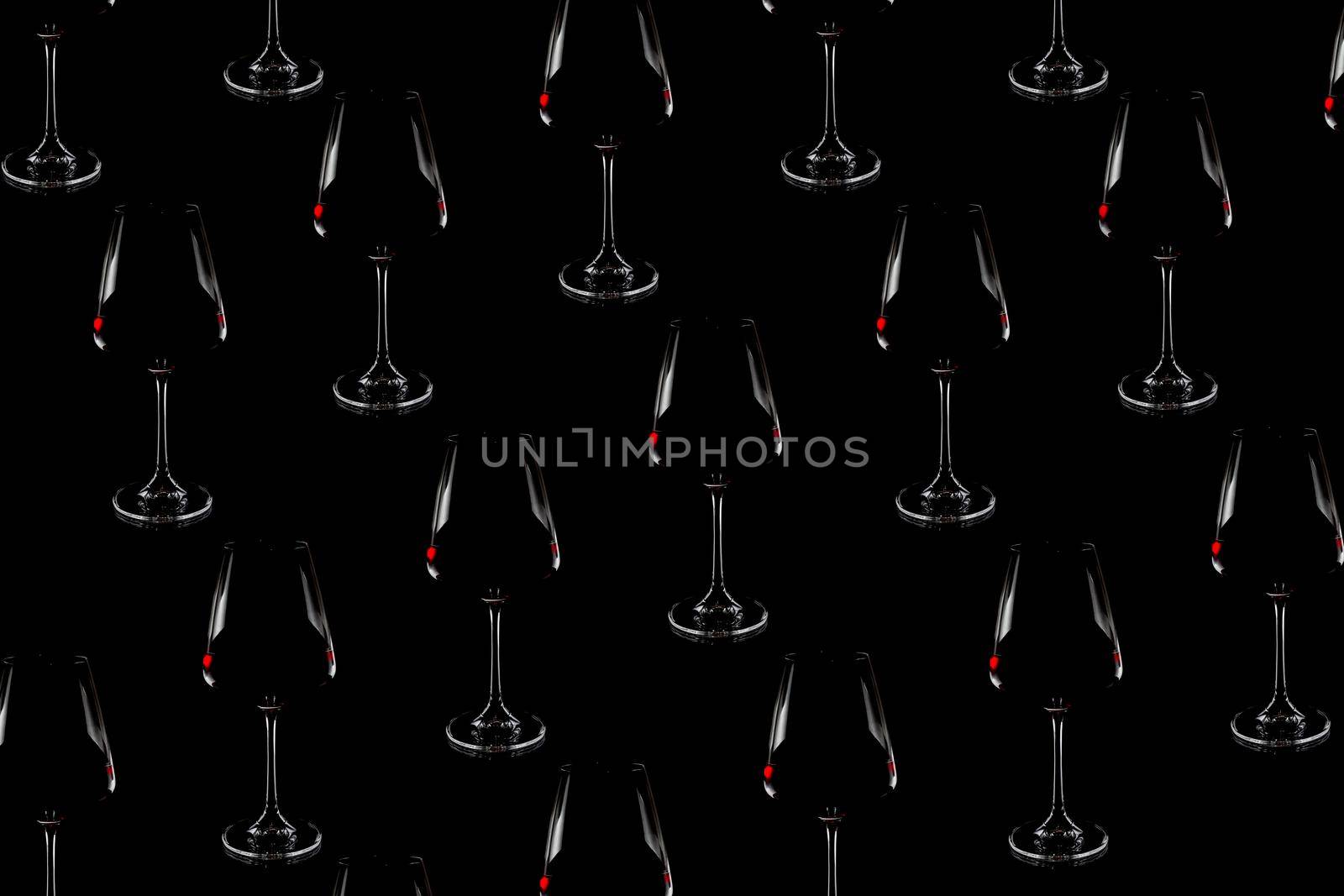 colorful pattern of a wine glass on a black background top view. High quality photo