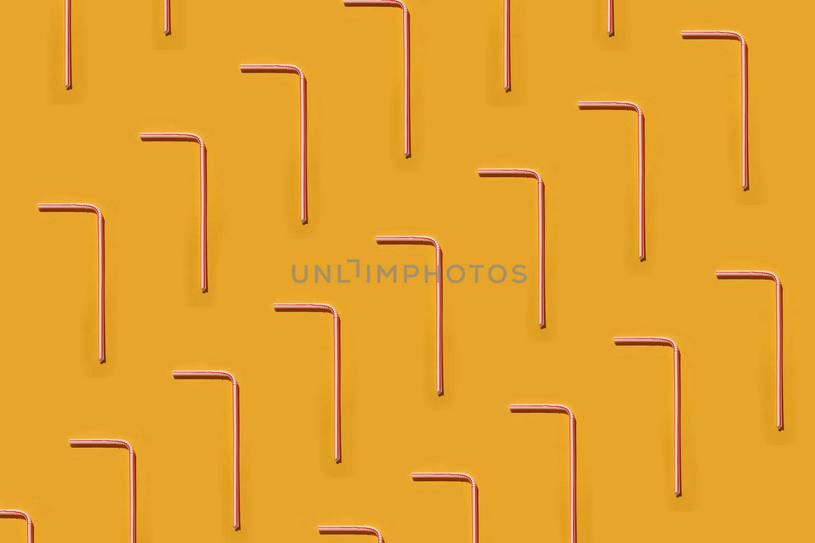 colorful pattern of drinking pipes on a colorful background top view. High quality photo