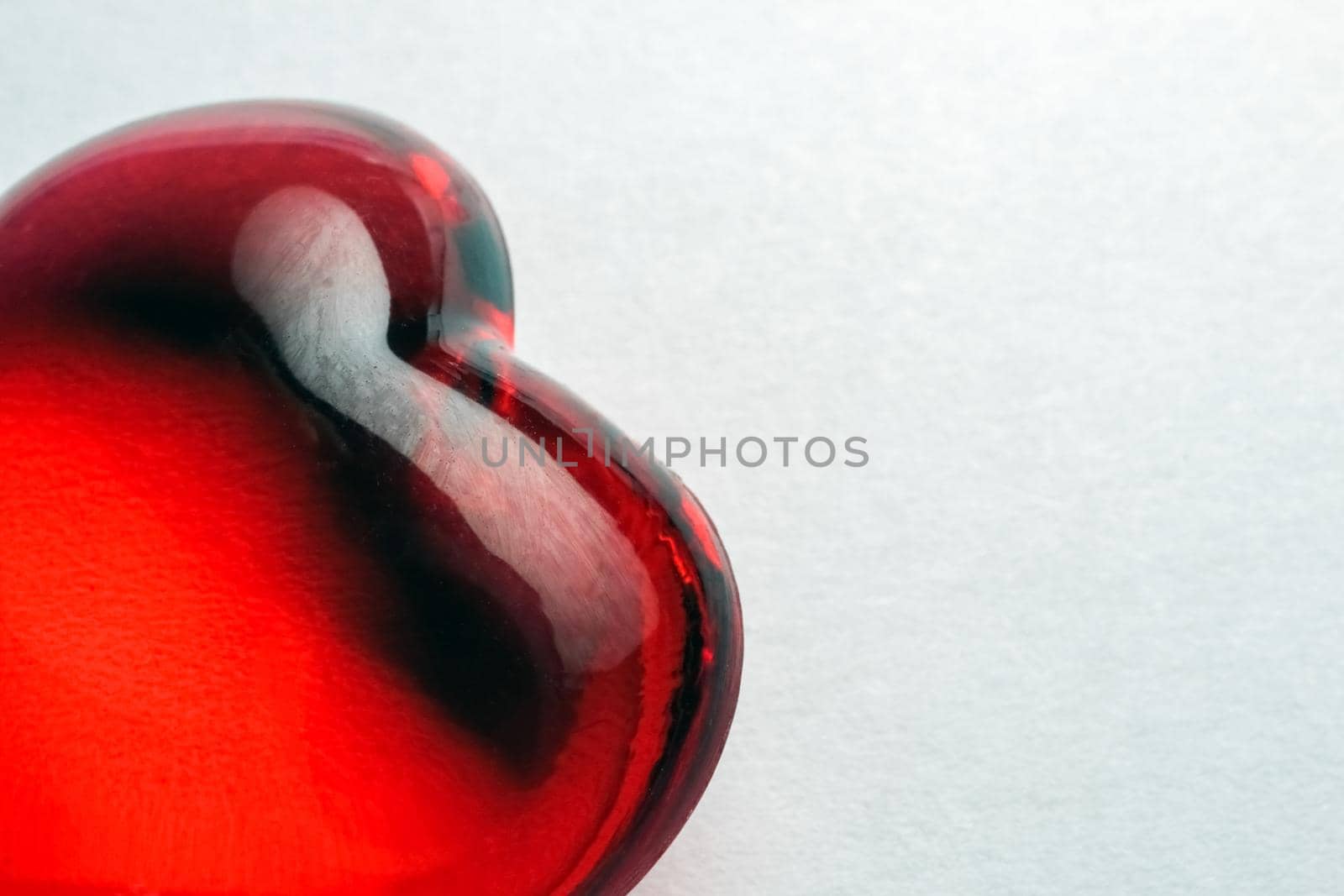 glass heart on a white background isolate. High quality photo