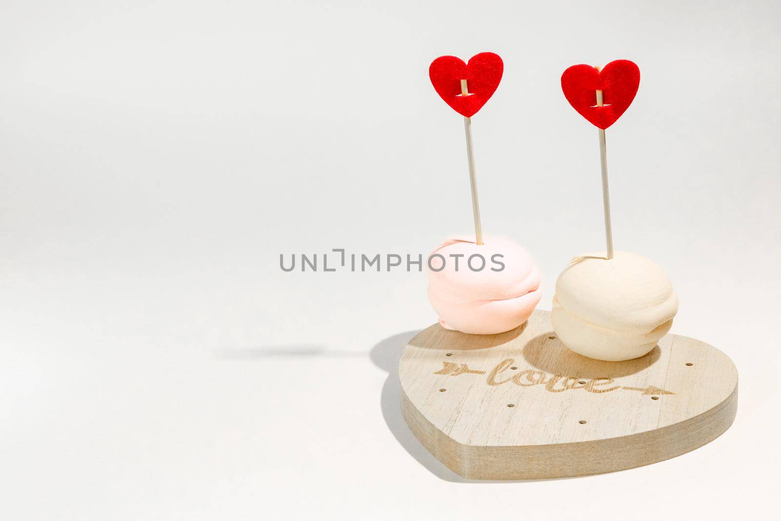 marshmallows on the Board with the inscription love. High quality photo