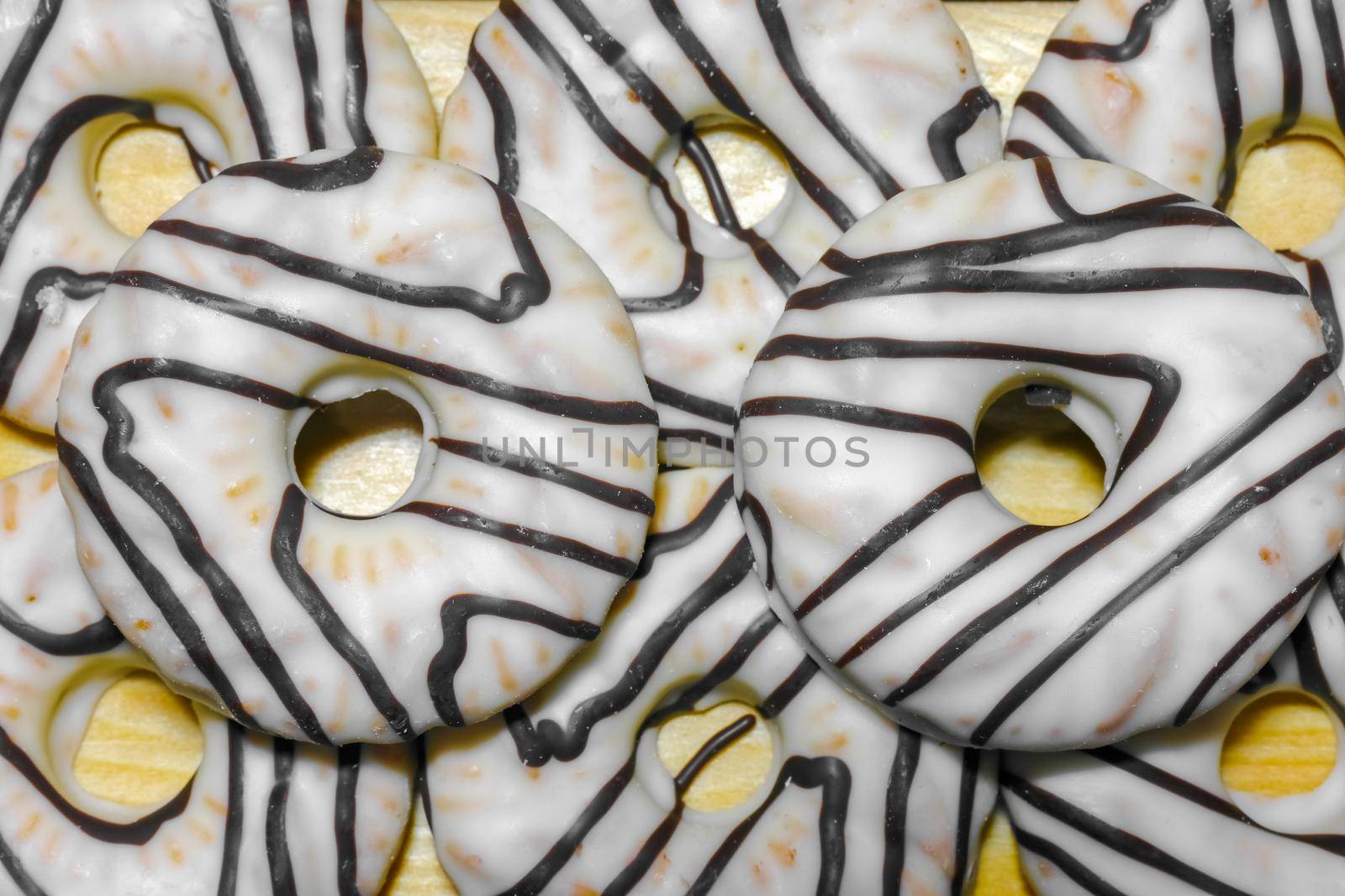 cookies in white chocolate on a wooden background top view. High quality photo