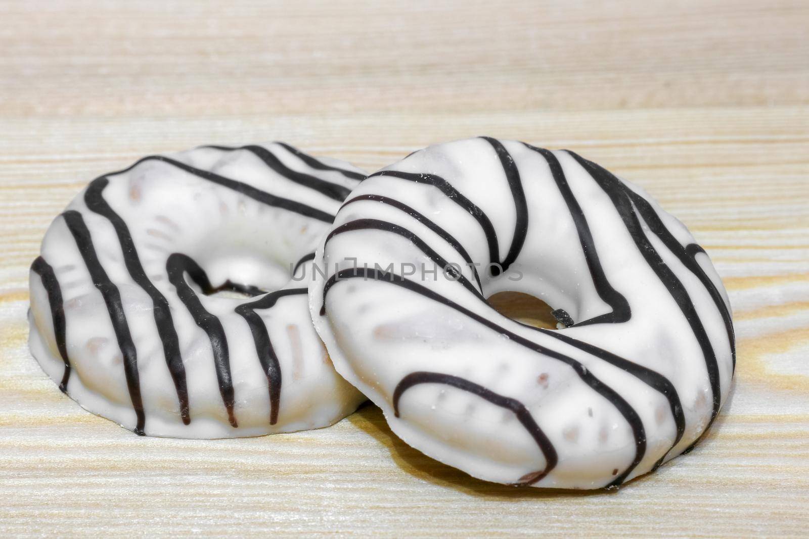 cookies in white chocolate on a wooden background top view by roman112007