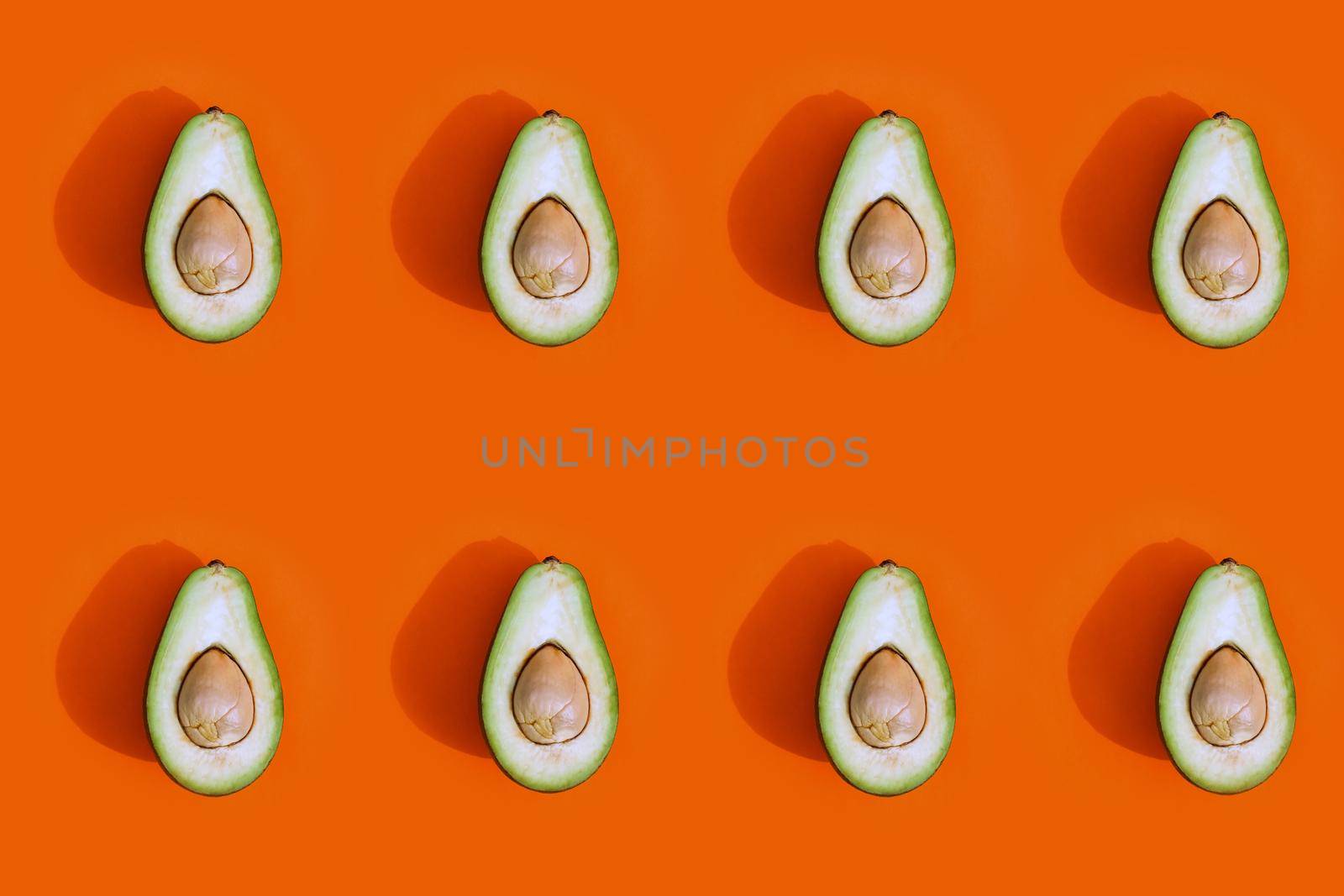 avocado color on a solid background, the top view pattern. High quality photo