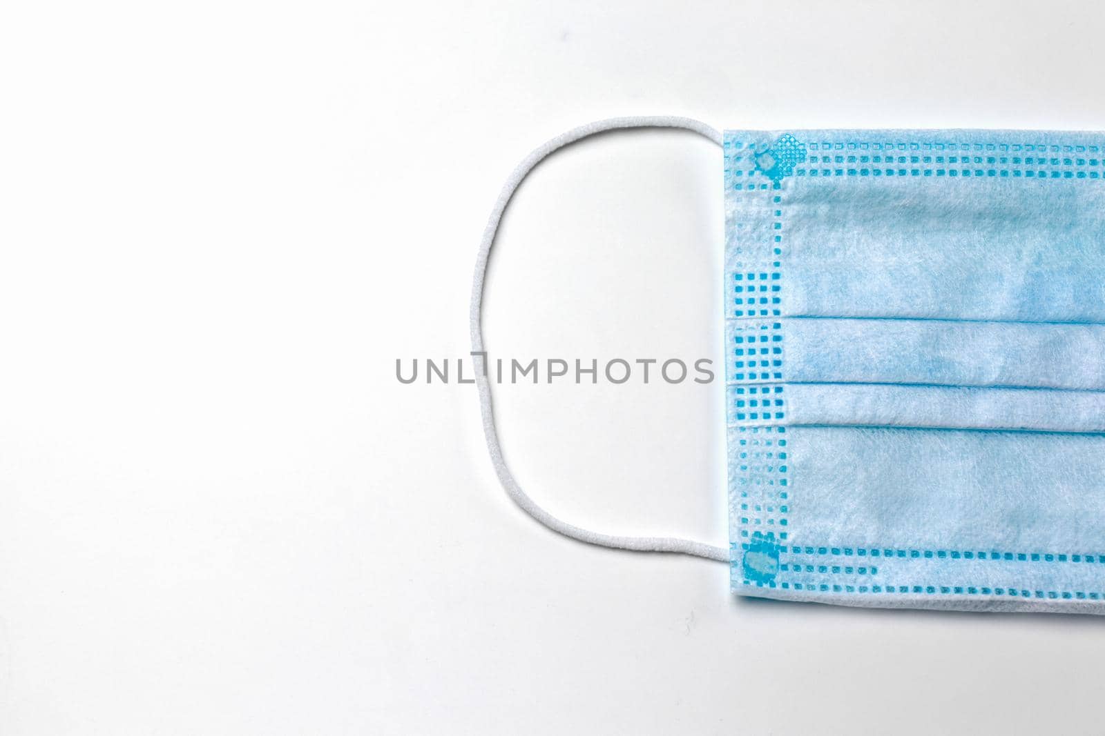 medical mask on a white background isolate macro by roman112007