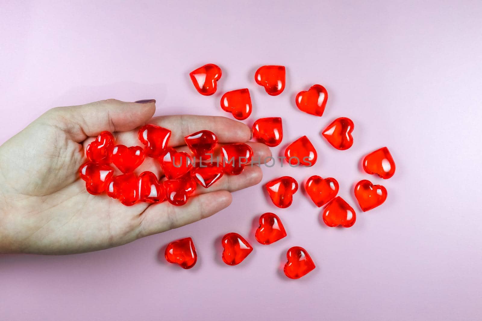 glass hearts on your hand Close up. High quality photo