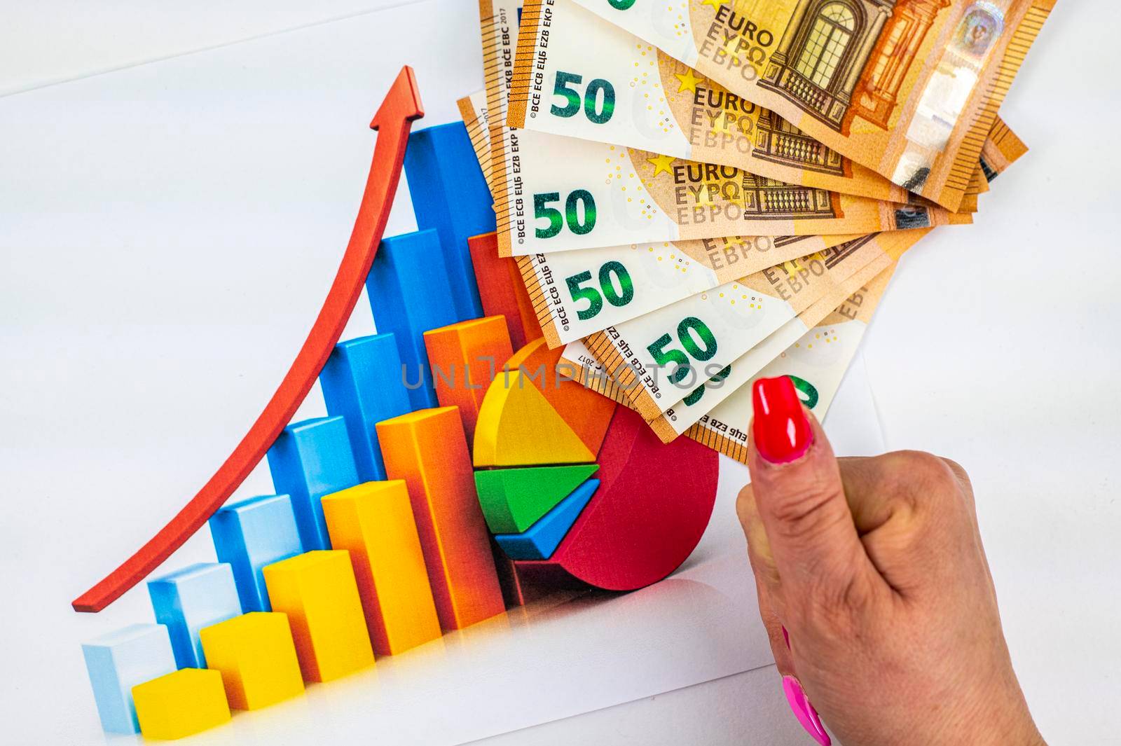 statistics chart with 50 bills and woman hand doing ok on white background