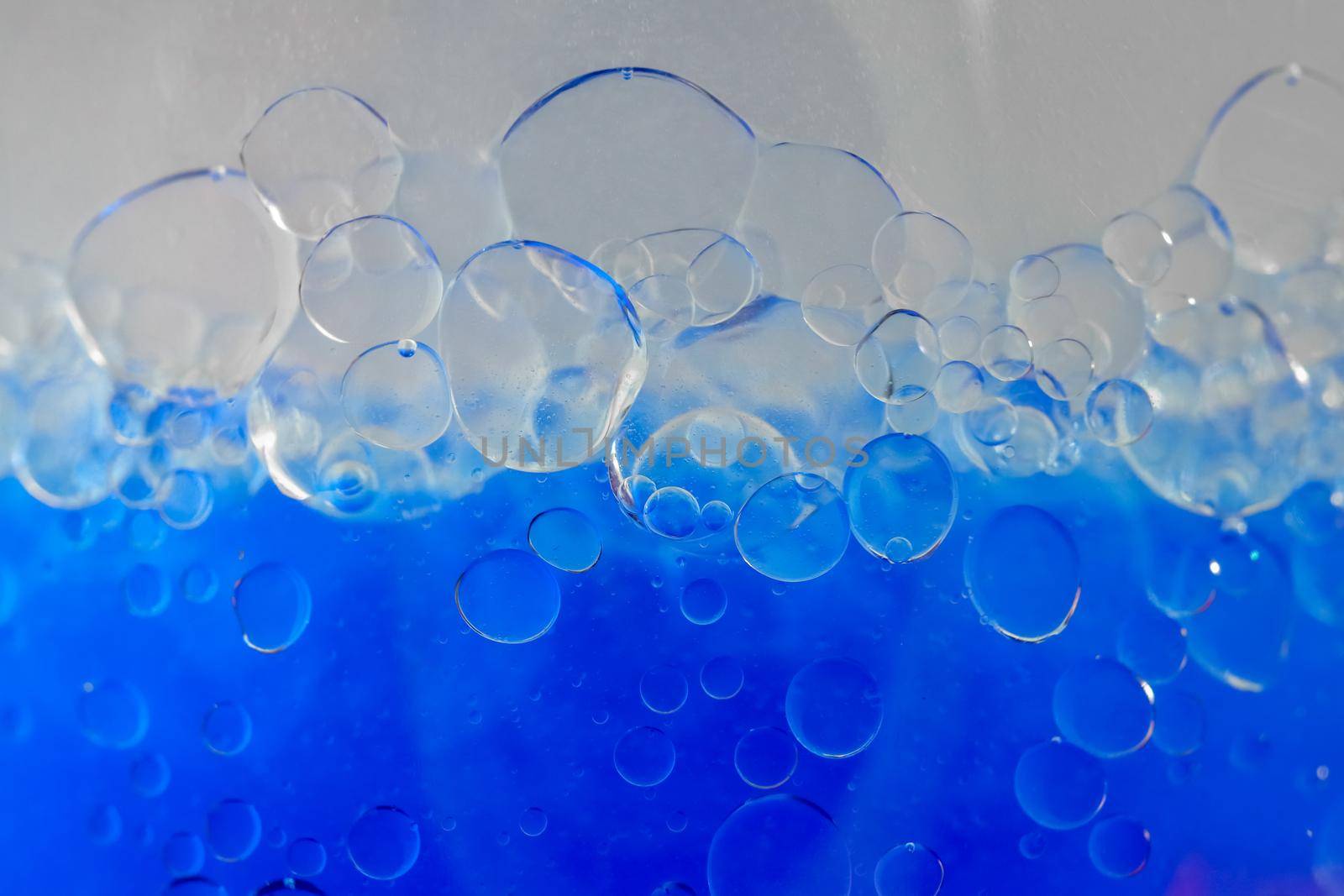 air bubbles in blue shampoos as background by roman112007