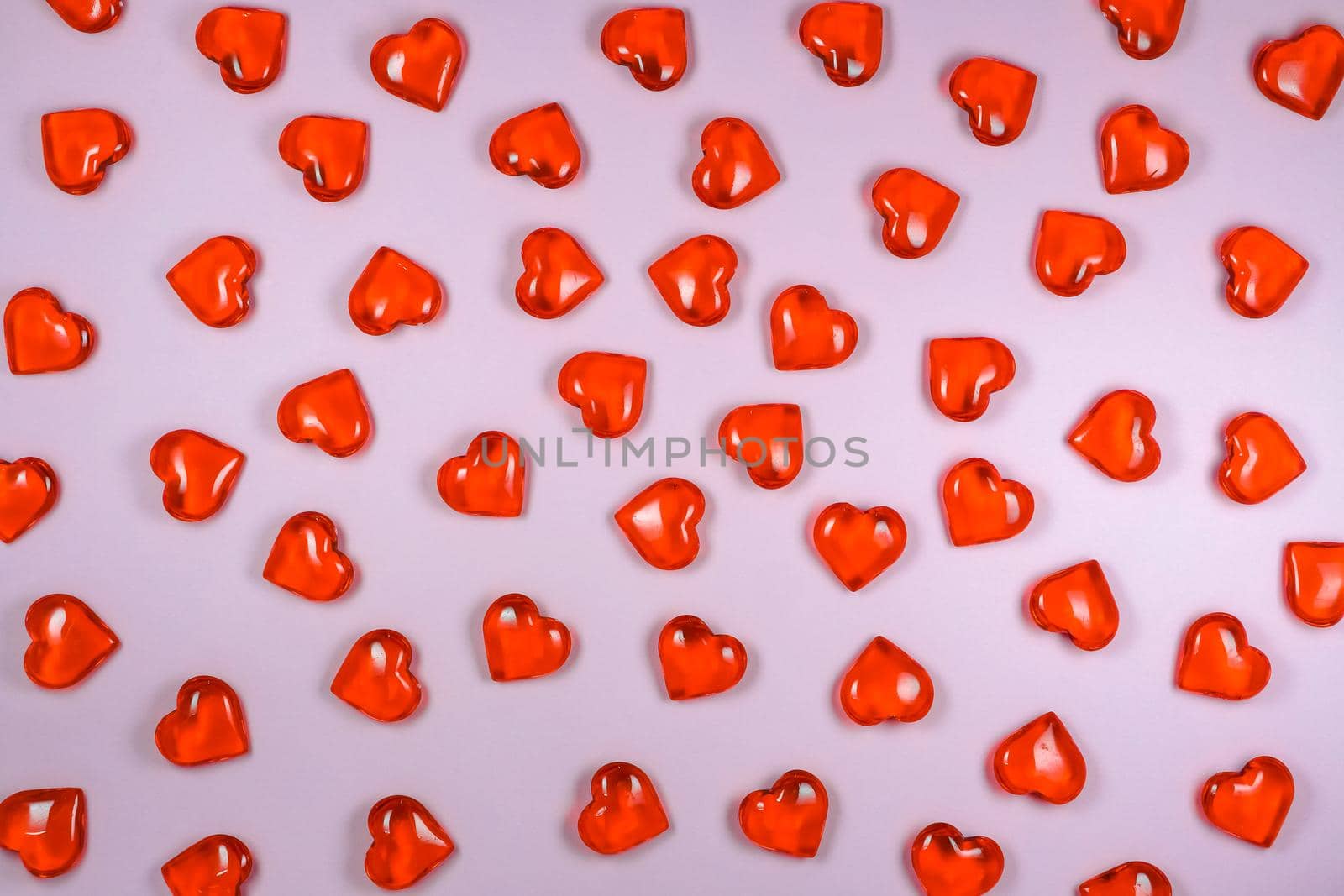 glass hearts on a purple background macro. High quality photo