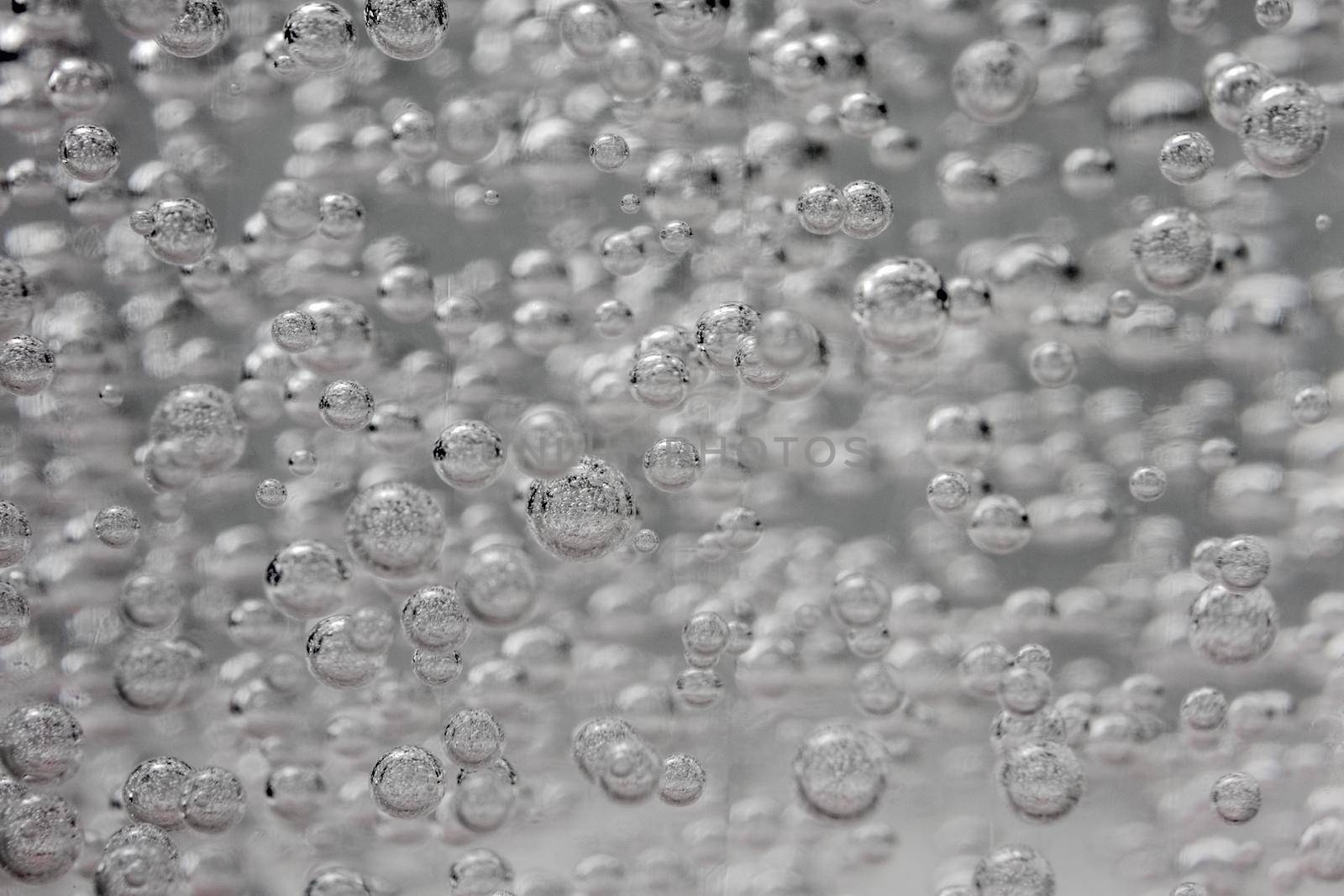 air bubbles in blue shampoos as background. High quality photo