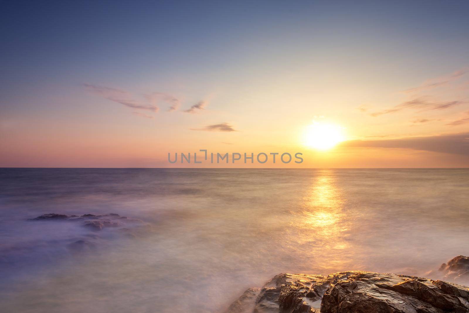 Beautiful sunrise over the sea by ba11istic