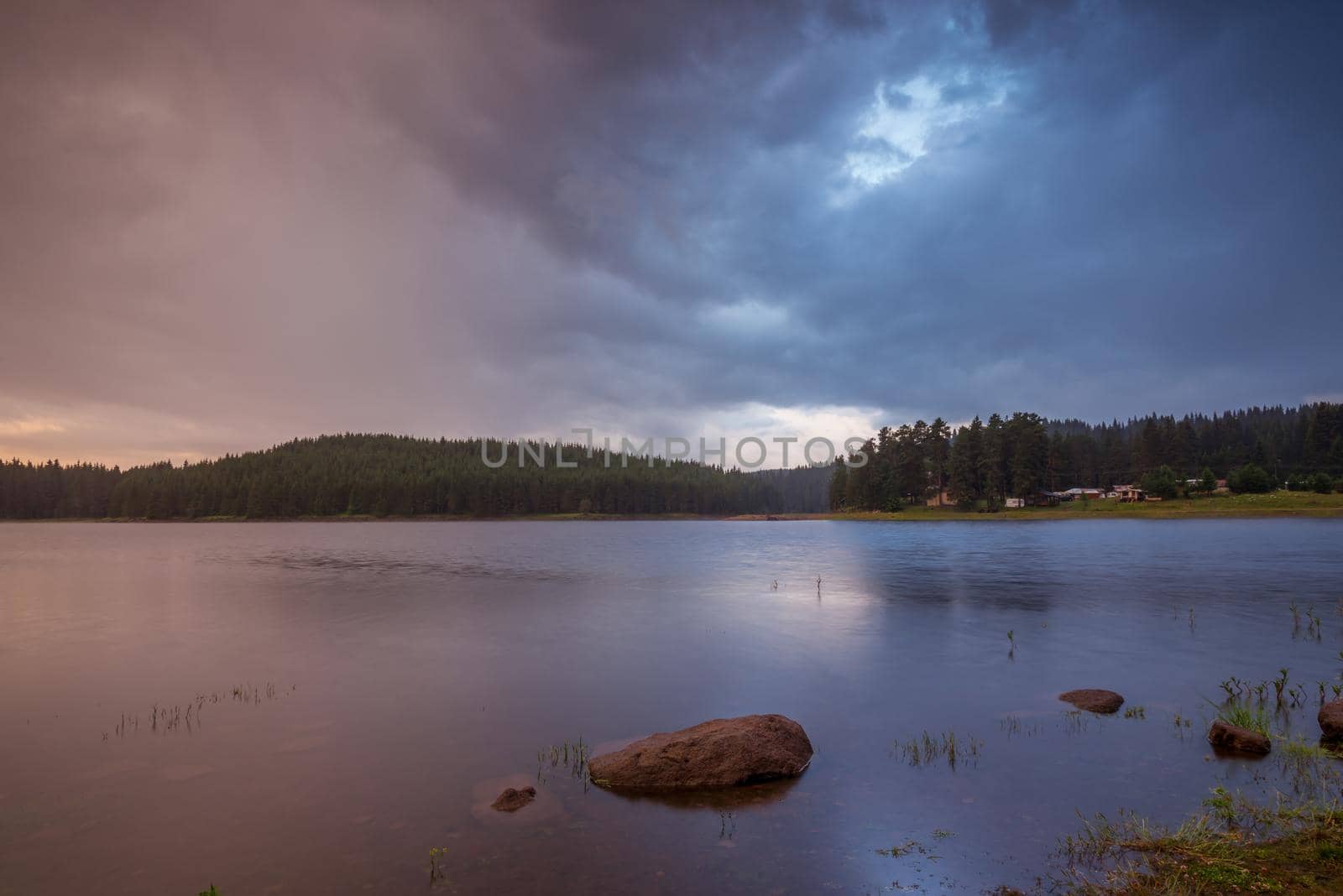 Lake sunrise / Beautiful sunrise view of Shiroka Polyana dam in Rhodopi Mountains, Bulgaria