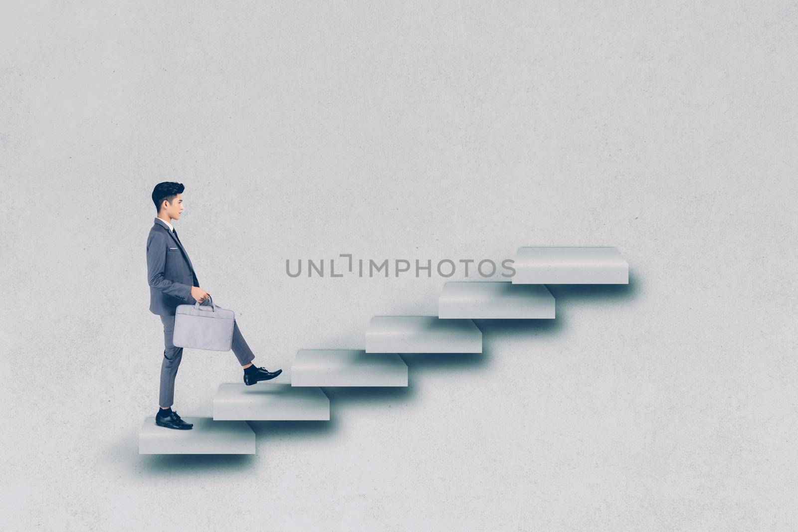Businessman in suit walking up stair to achievement, man is leader climbing with aspiration for goal, inspiration and development for inspiration while progress go to winner, business concept.