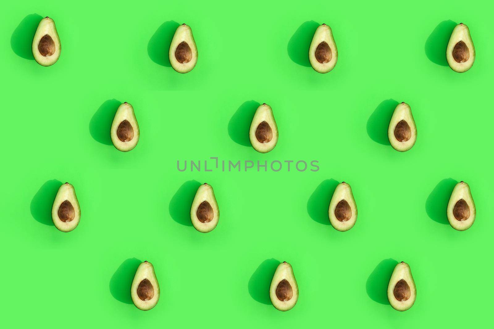 avocado color on a solid background, the top view pattern. High quality photo