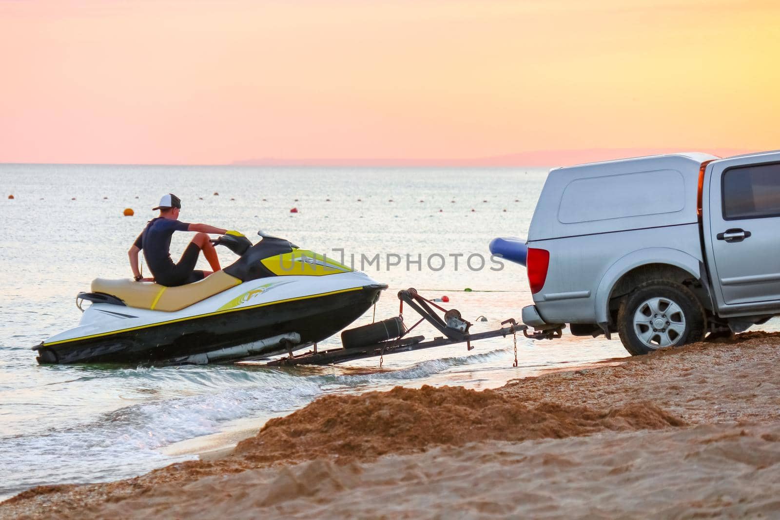 towing a jet ski to the shore by roman112007