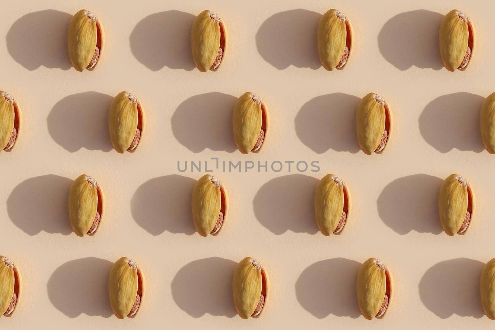 pistachio with a hard shadow in the top view pattern. High quality photo