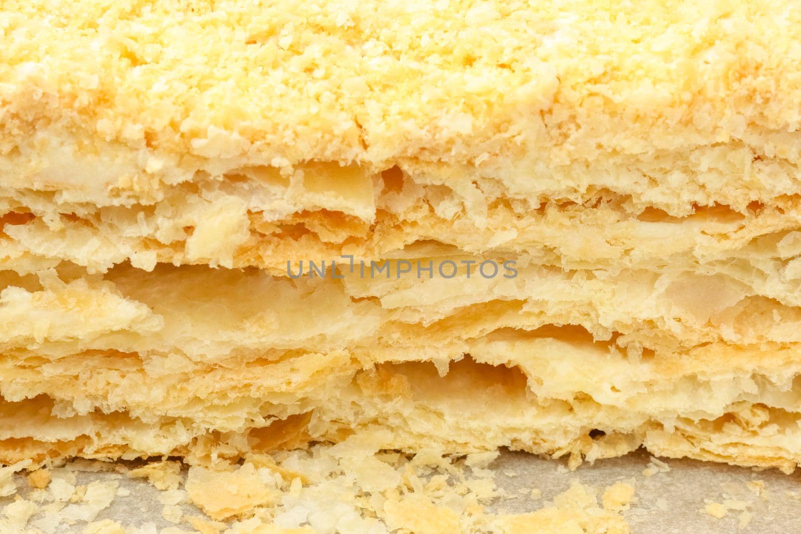 cut of a puff cake close-up on a white background by roman112007