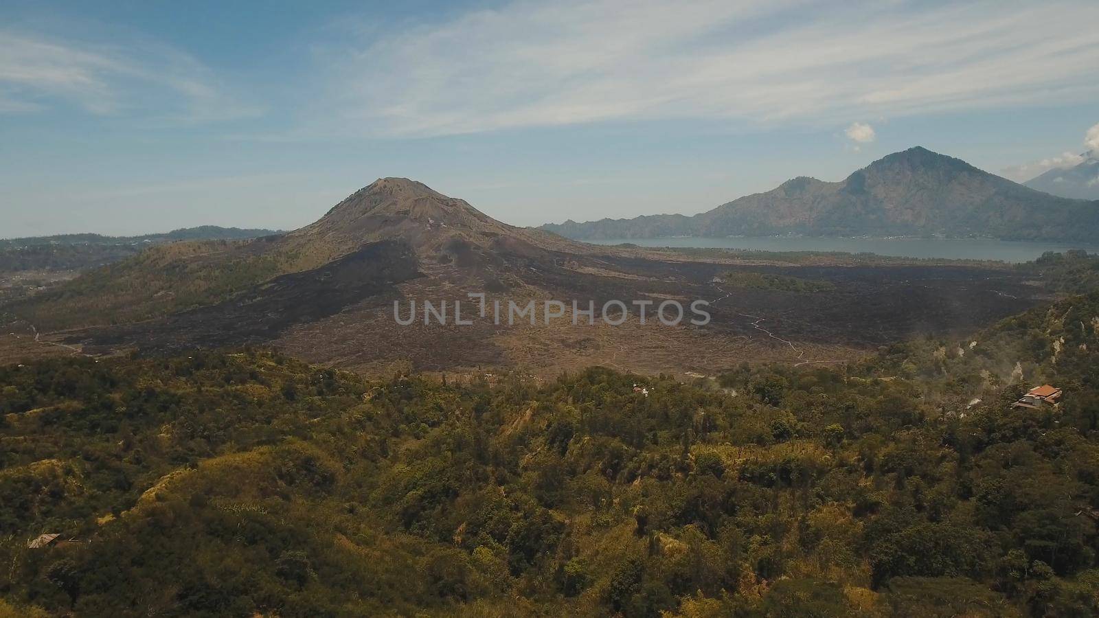 Aerial view of Mount Batur Volcano in Kintamani. Bali volcano, also referred to as Kintamani is popular sightseeing destination in Bali. Travel concept.