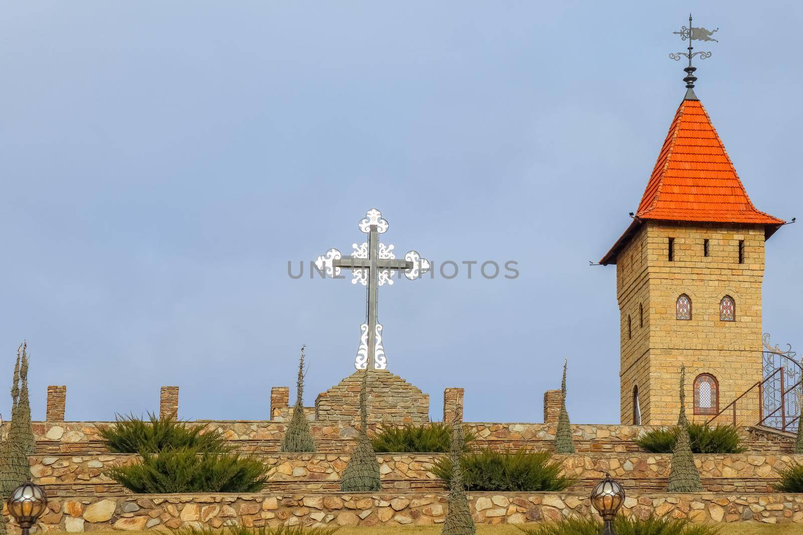 Church and cross against the blue sky by roman112007