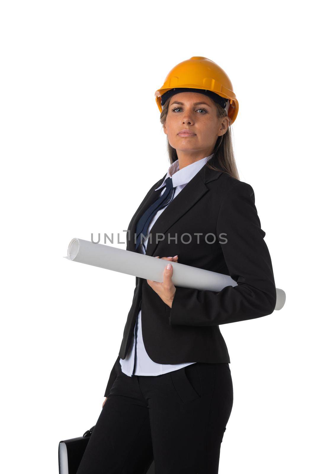 Portrait of female engeneer architect in yellow hardhat and business suit holding blueprint isolated on white background