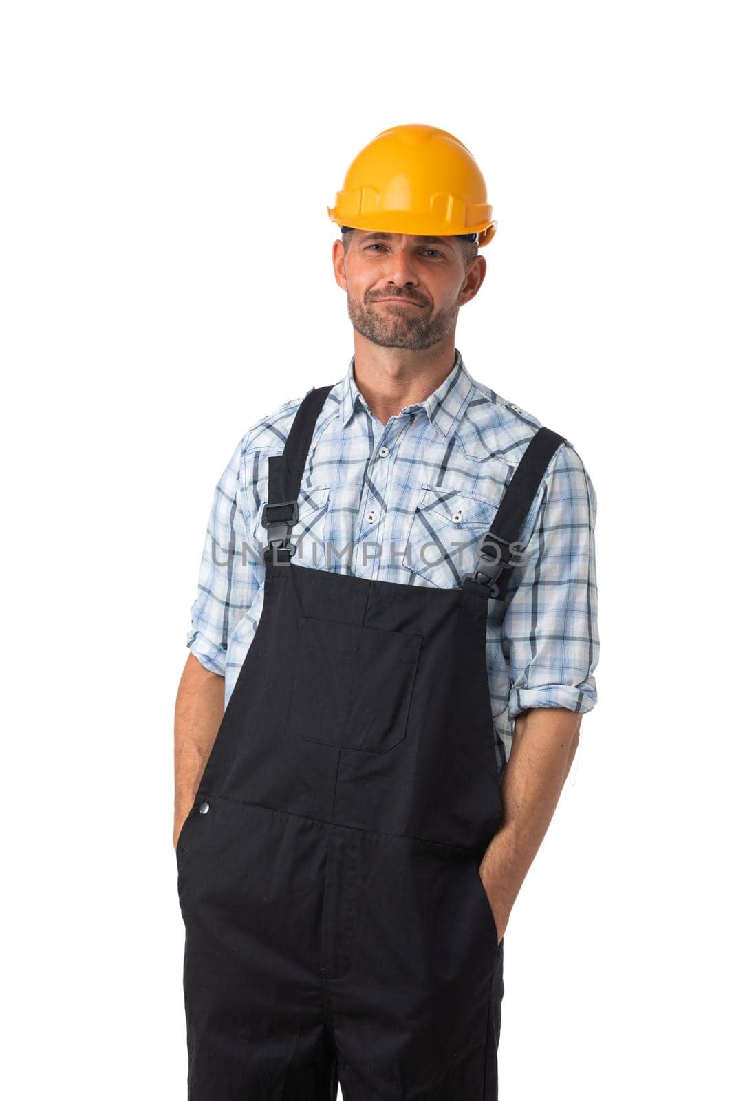 Portrait of a workman in coveralls and hardhat isolated on white background