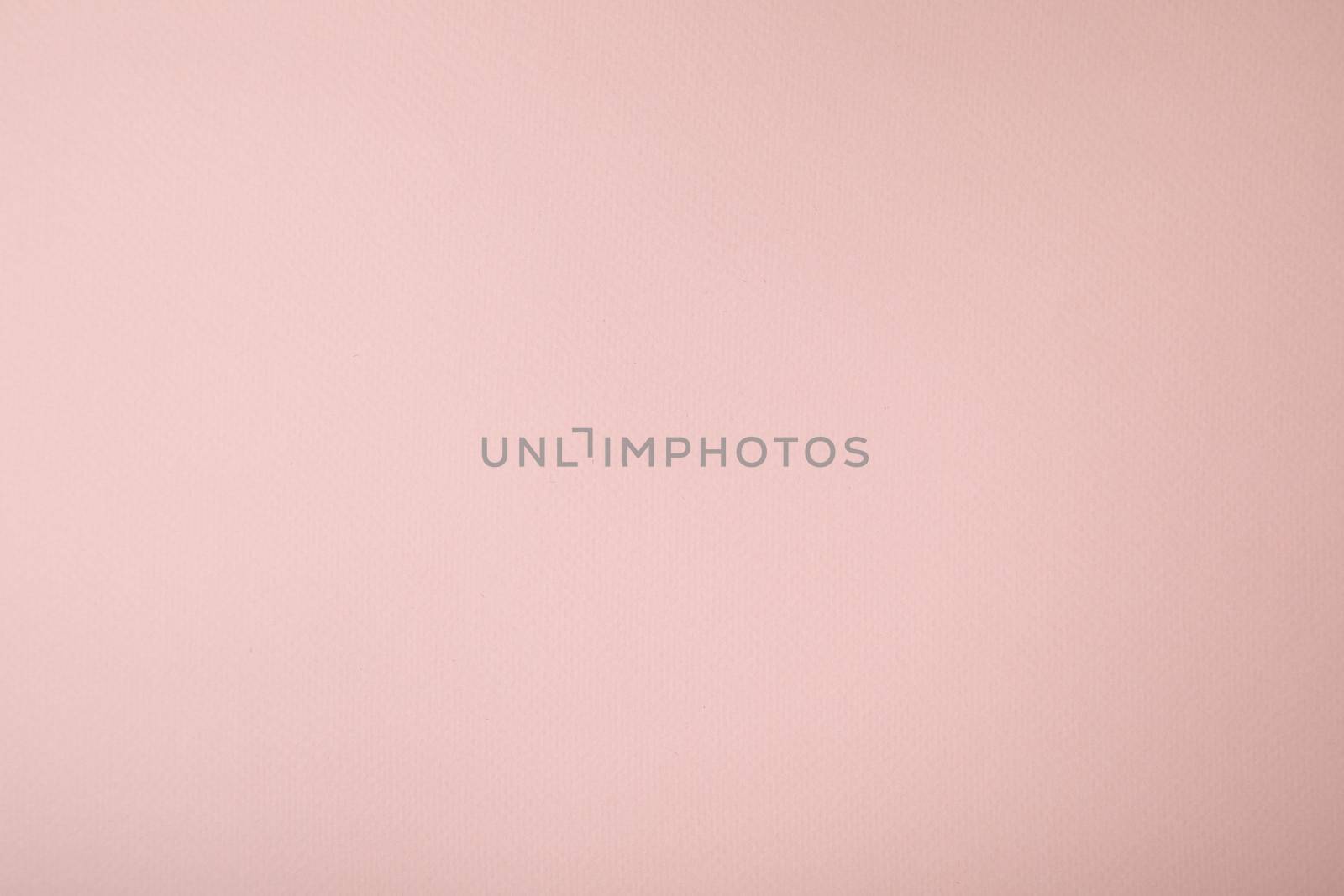 Pink background with paper texture, horizontal, blank space.