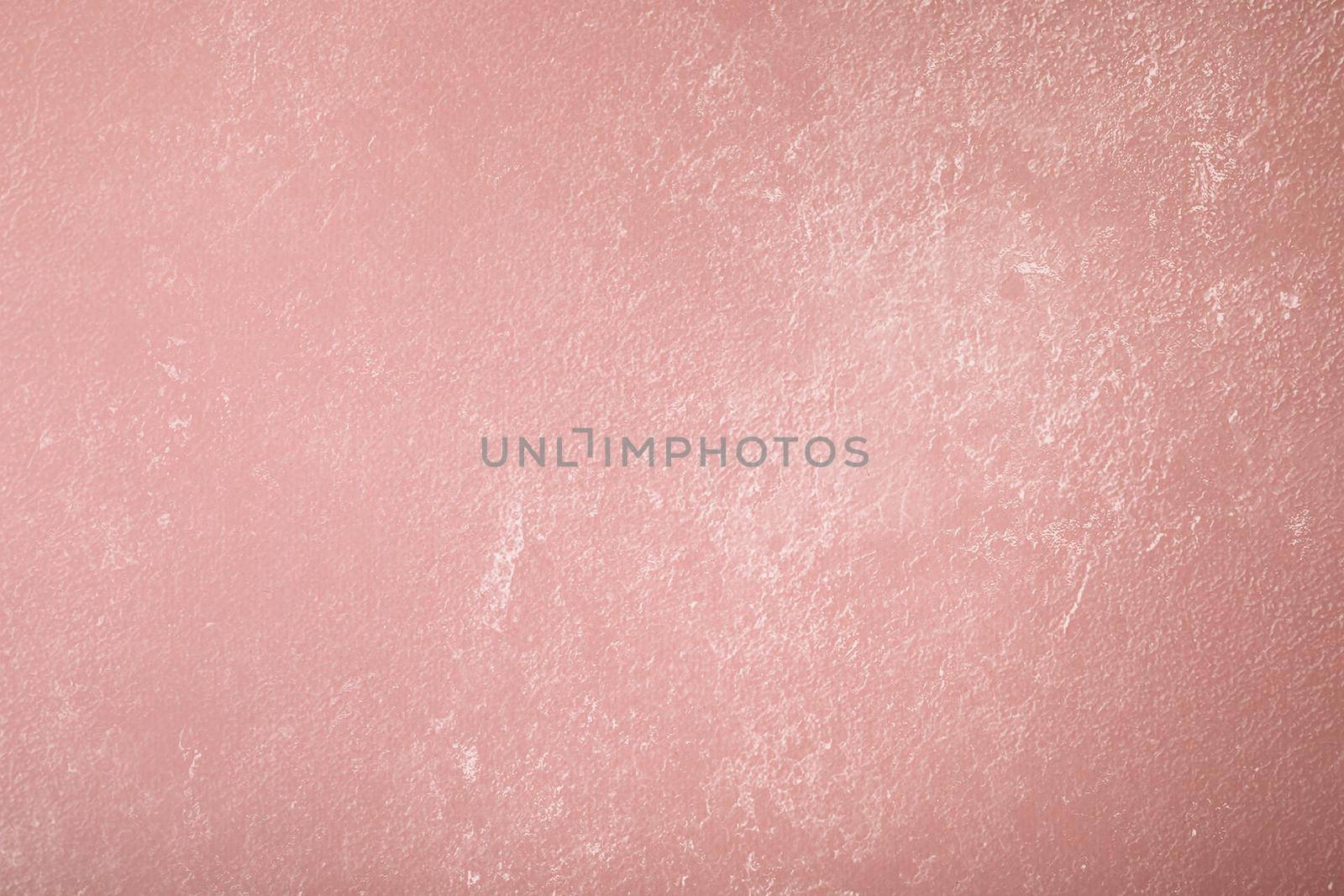 Pink background with paper texture, horizontal, blank space.