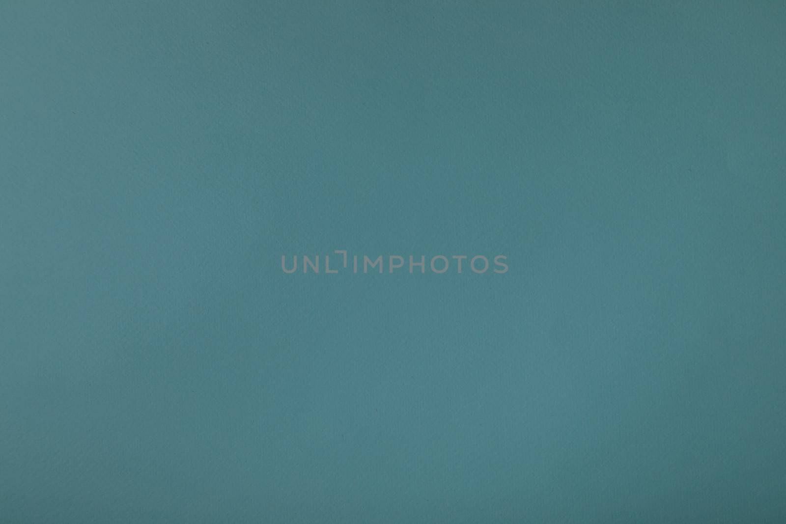 Blue background with paper texture, horizontal, blank space.