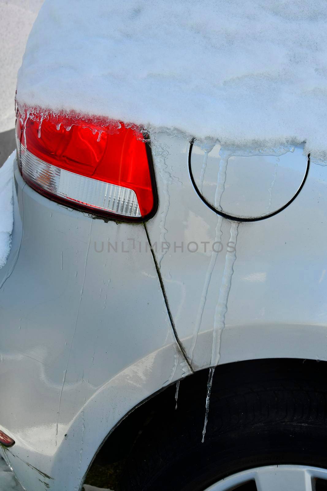 icicles on a car fender