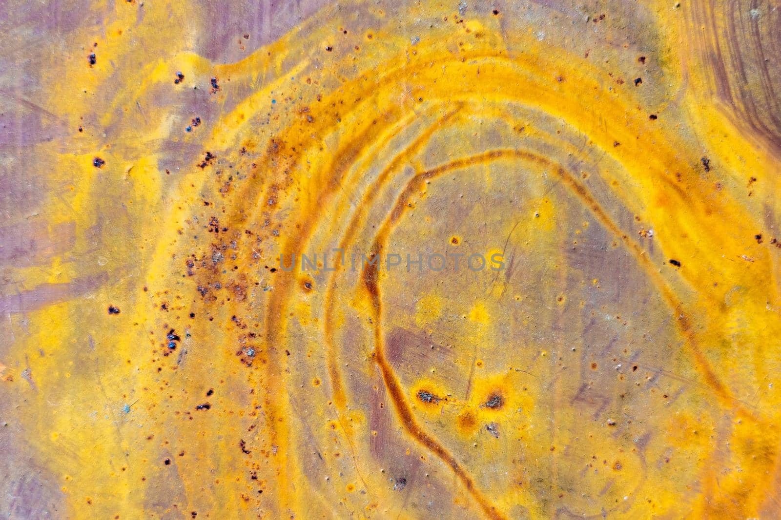 Rust, steel, background. Peeling off old paint Blue yellow white