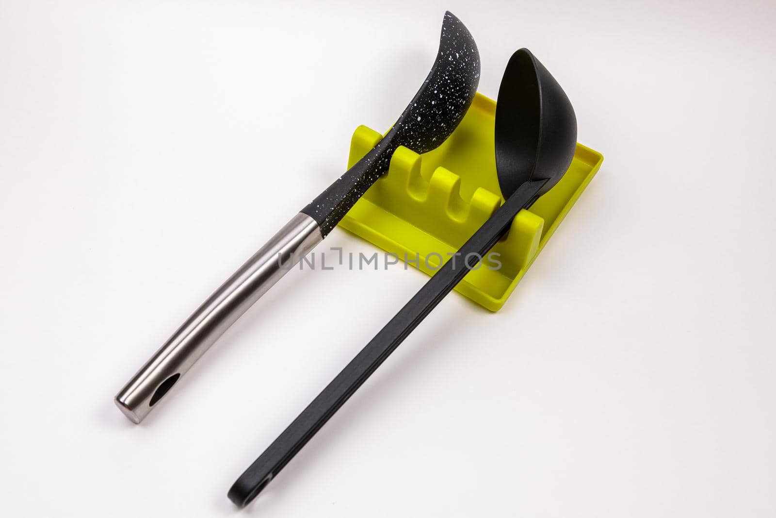 Stand, tray for large spoons, ladles, stirrers. Modern fittings in the kitchen. Convenient to prepare food.