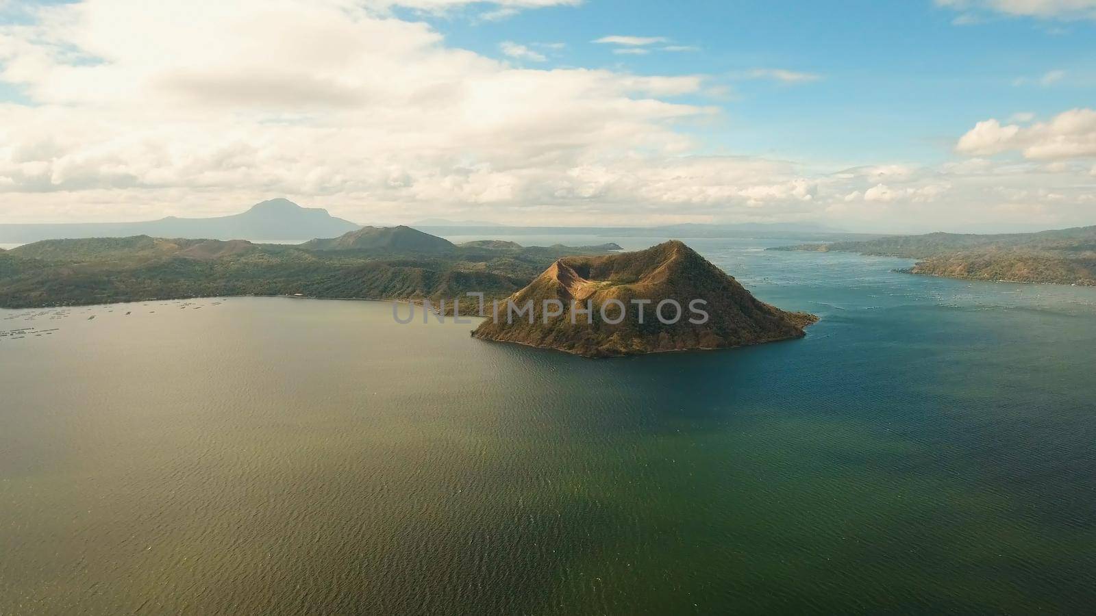 Aerial view Taal Volcano on Luzon Island North of Manila in Philippines. Volcano with a crater on an island in the middle of a lake. Luzon, Philippines. Travel concept.