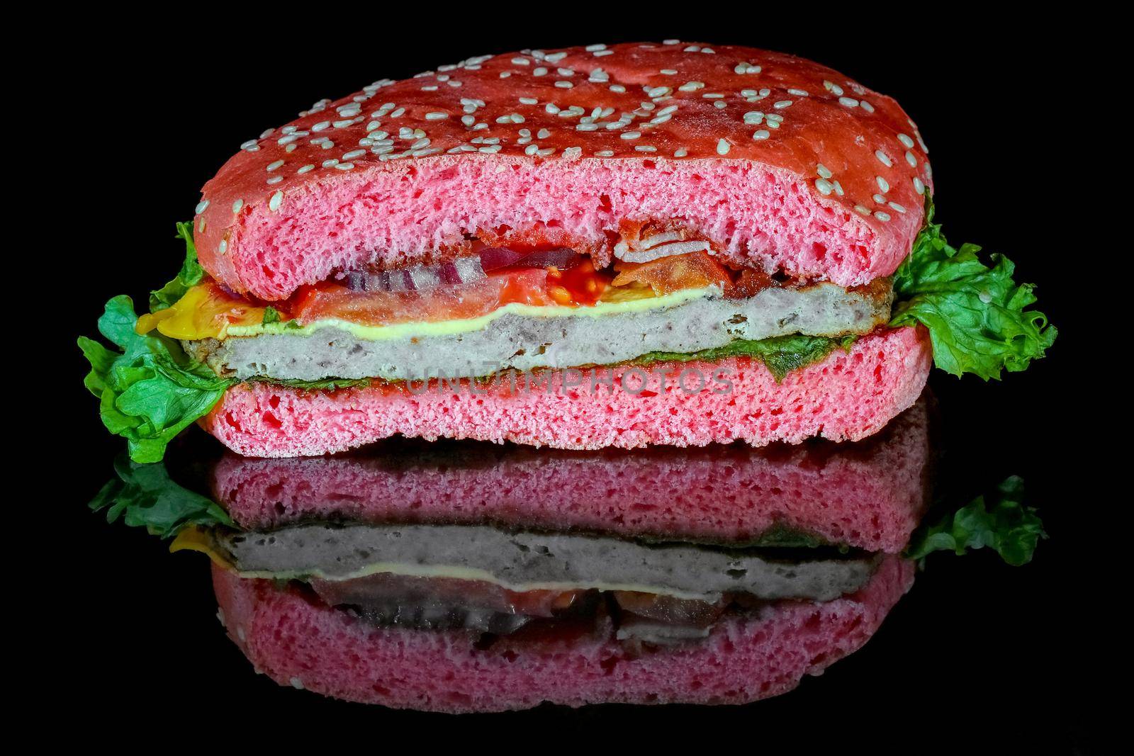 red hamburger on a black background macro. High quality photo
