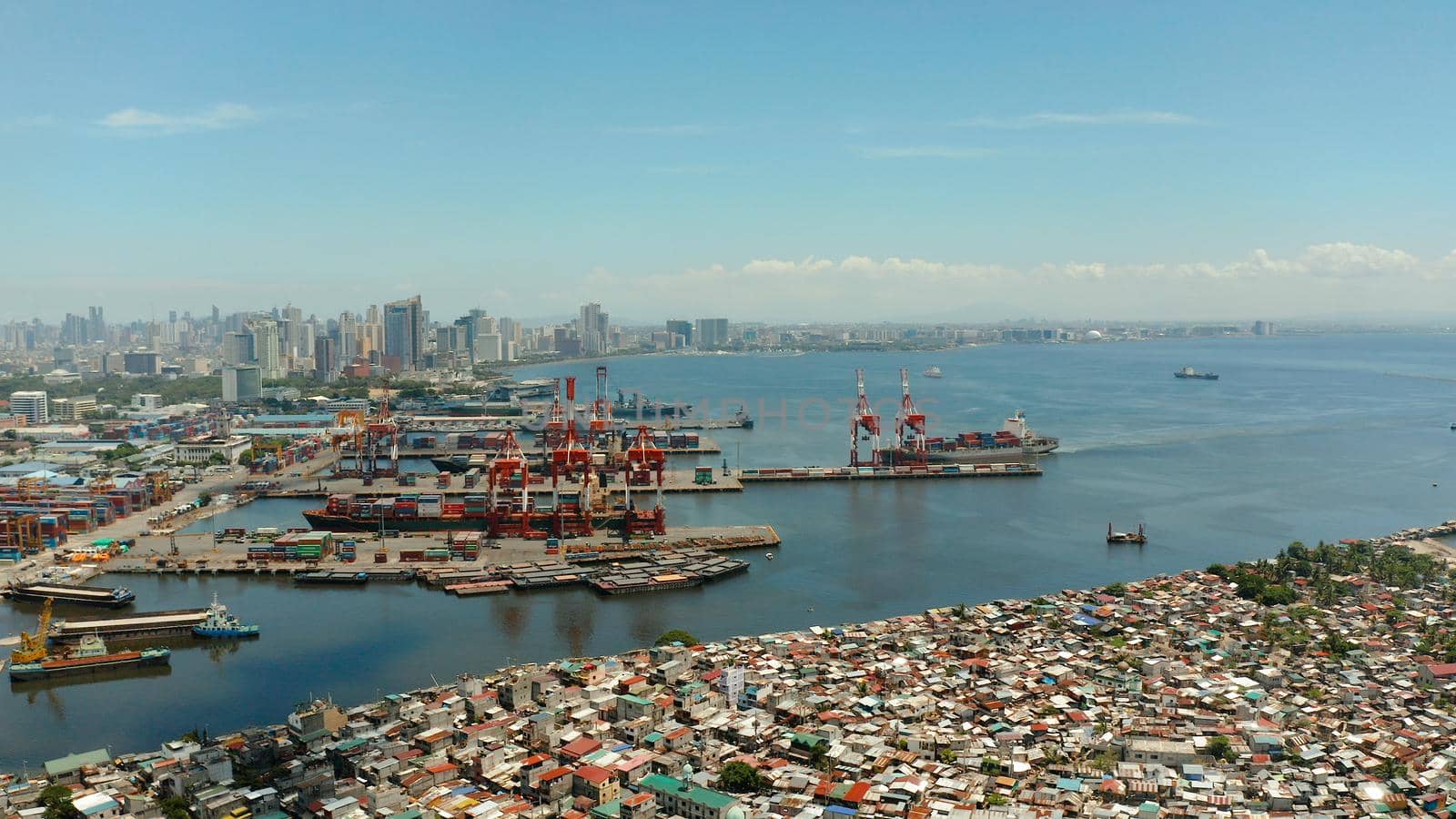 Cityscape of the capital of the Philippines Manila with the port and business centers, skyscrapers. Travel vacation concept
