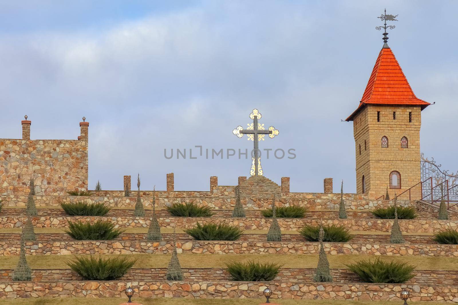 Church and cross against the blue sky. High quality photo