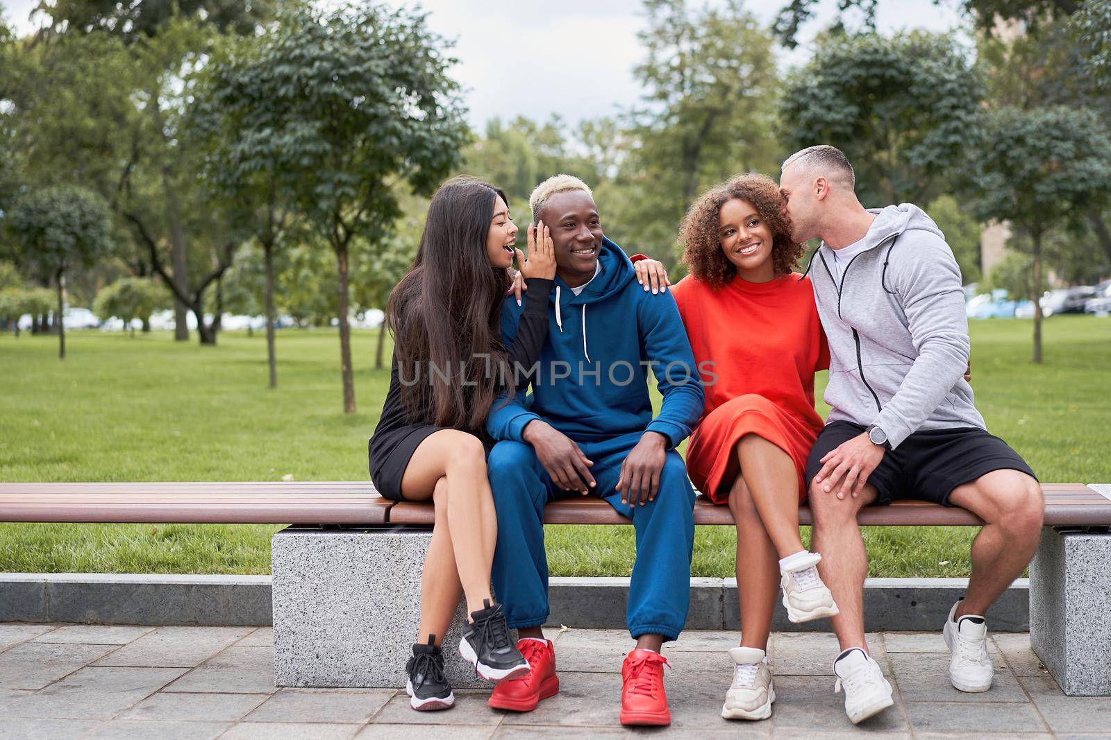 Multi-ethnic group people teenage friends. African-american, asian, caucasian student spending time together Multiracial friendship by andreonegin