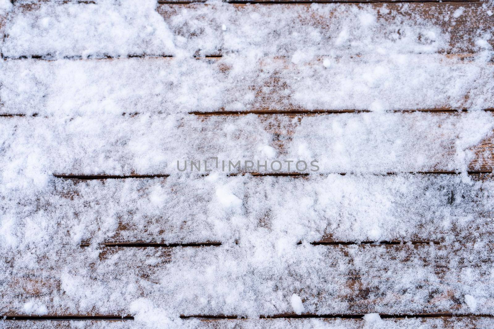 Winter background. Empty wooden plank with snow, copy space for text Wood table product display Christmas time mock up