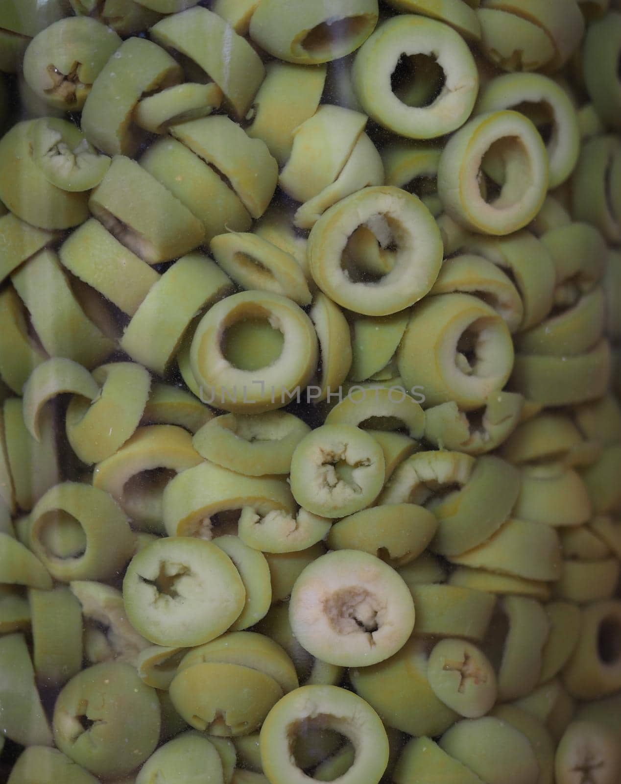 sliced green olives in brine useful as a background