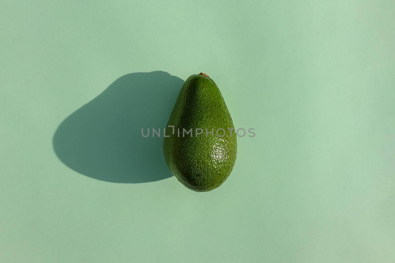 avocado on a colored background food pattern by roman112007