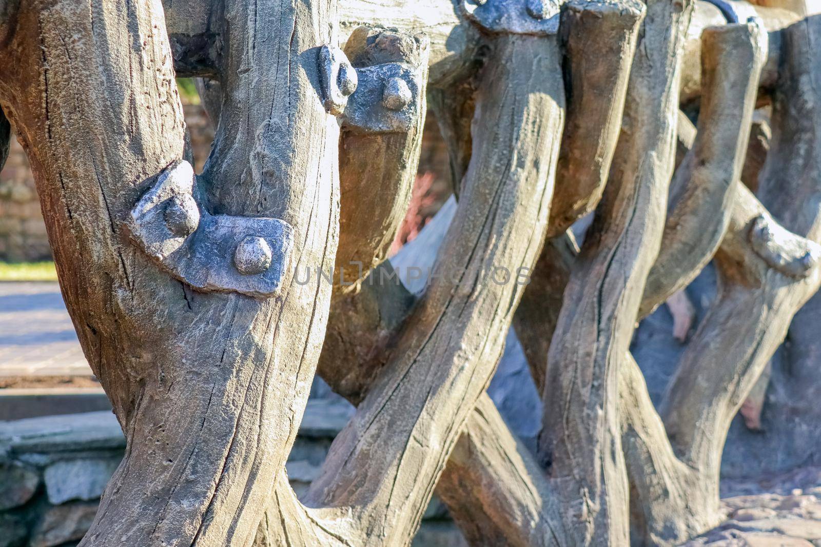 sidewalk fence made of tree branches as background. High quality photo