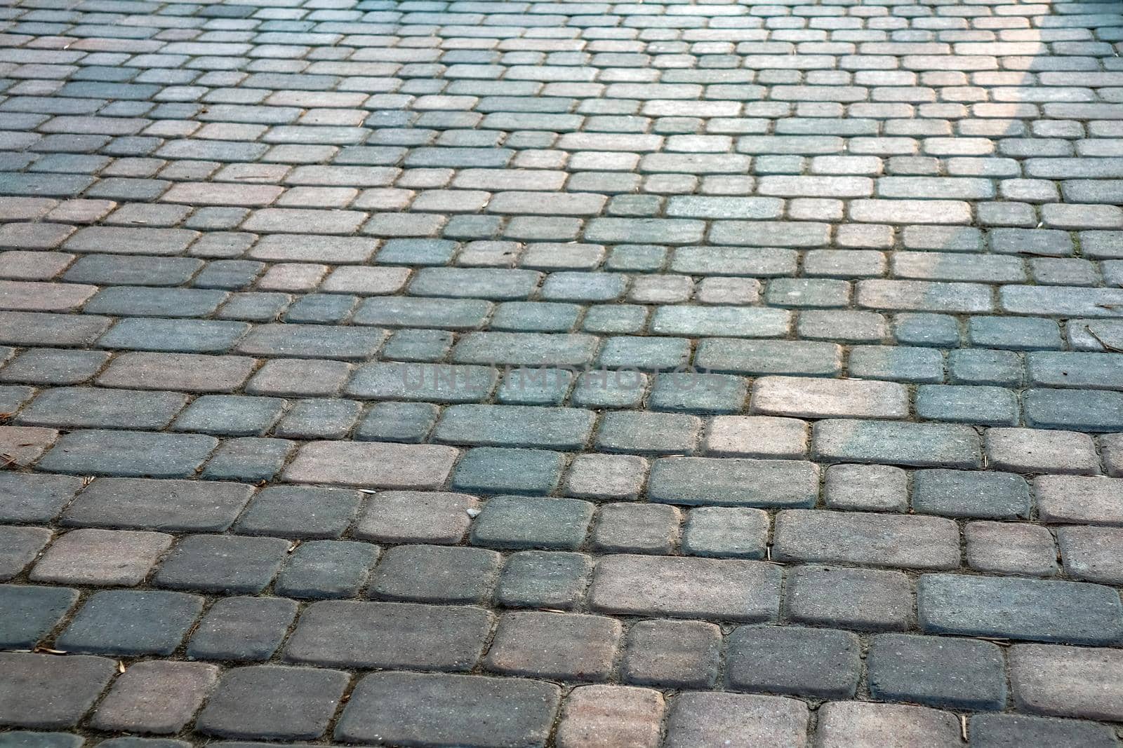 masonry wall paving stones as a background close up by roman112007