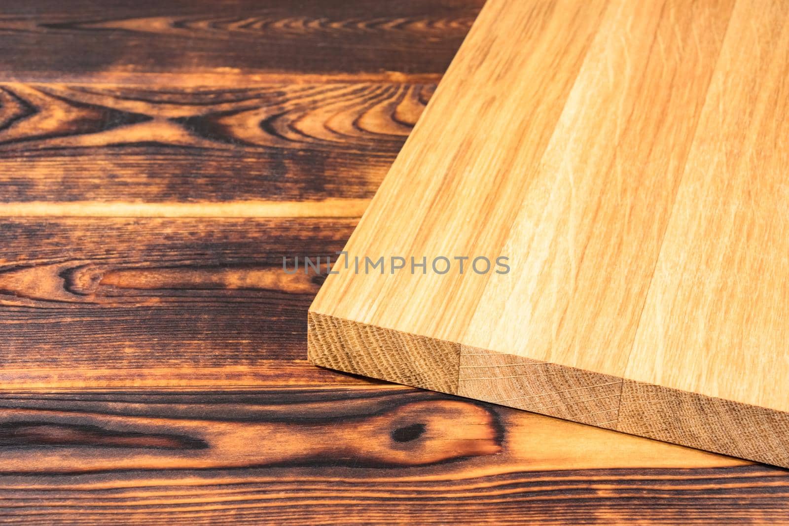 cutting Board on a wooden background top view by roman112007