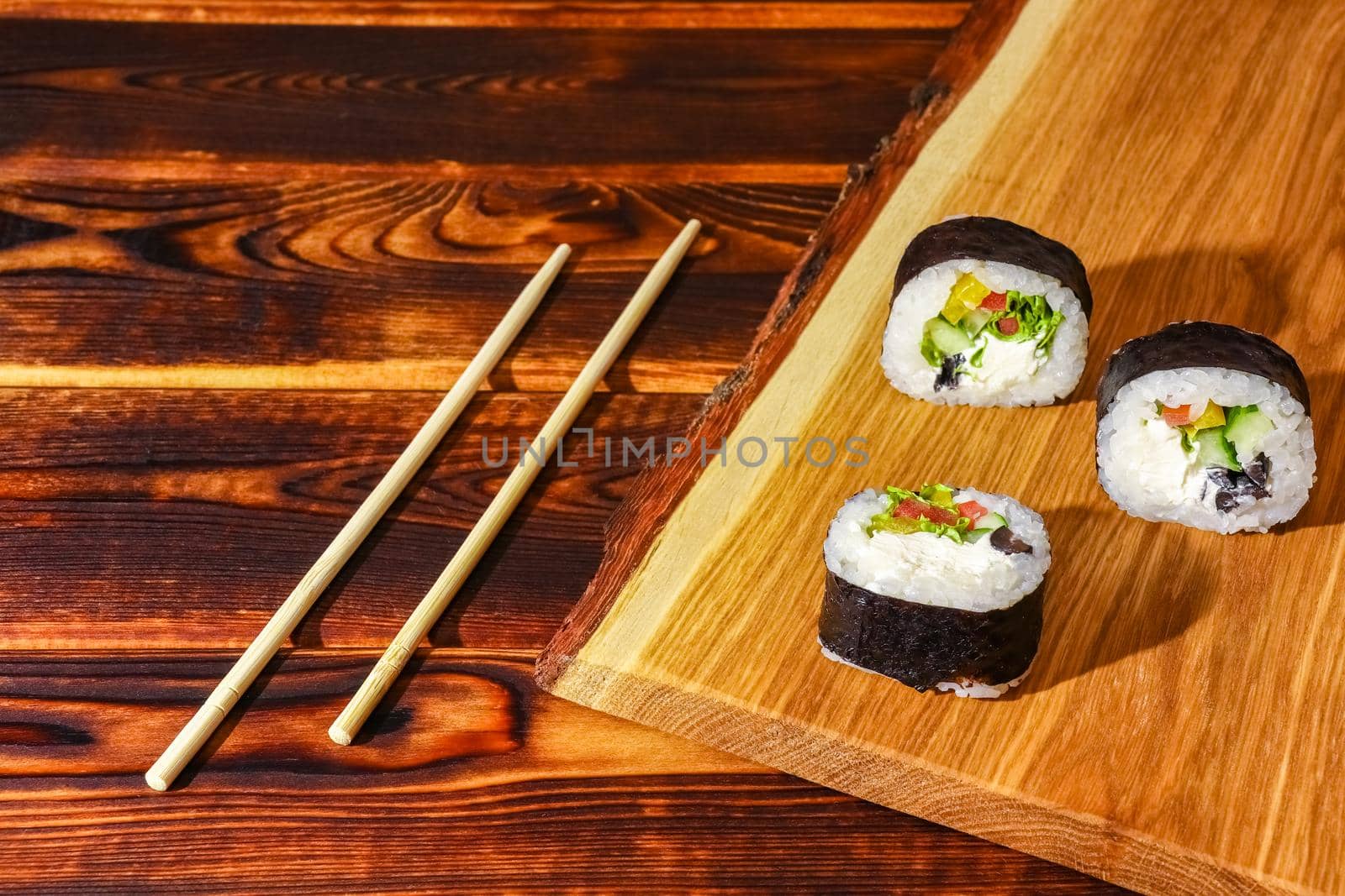 sushi on a wooden background close up by roman112007