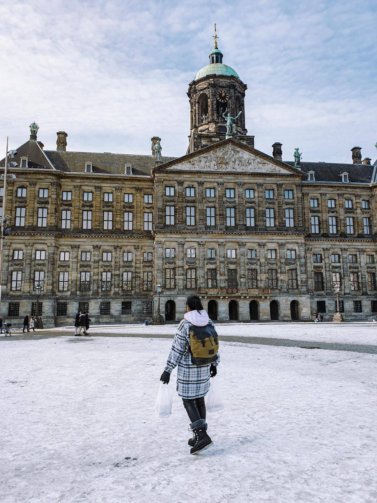 Amsterdam Netherlands, frozen canals and people ice skating in Amsterdam by fokkebok