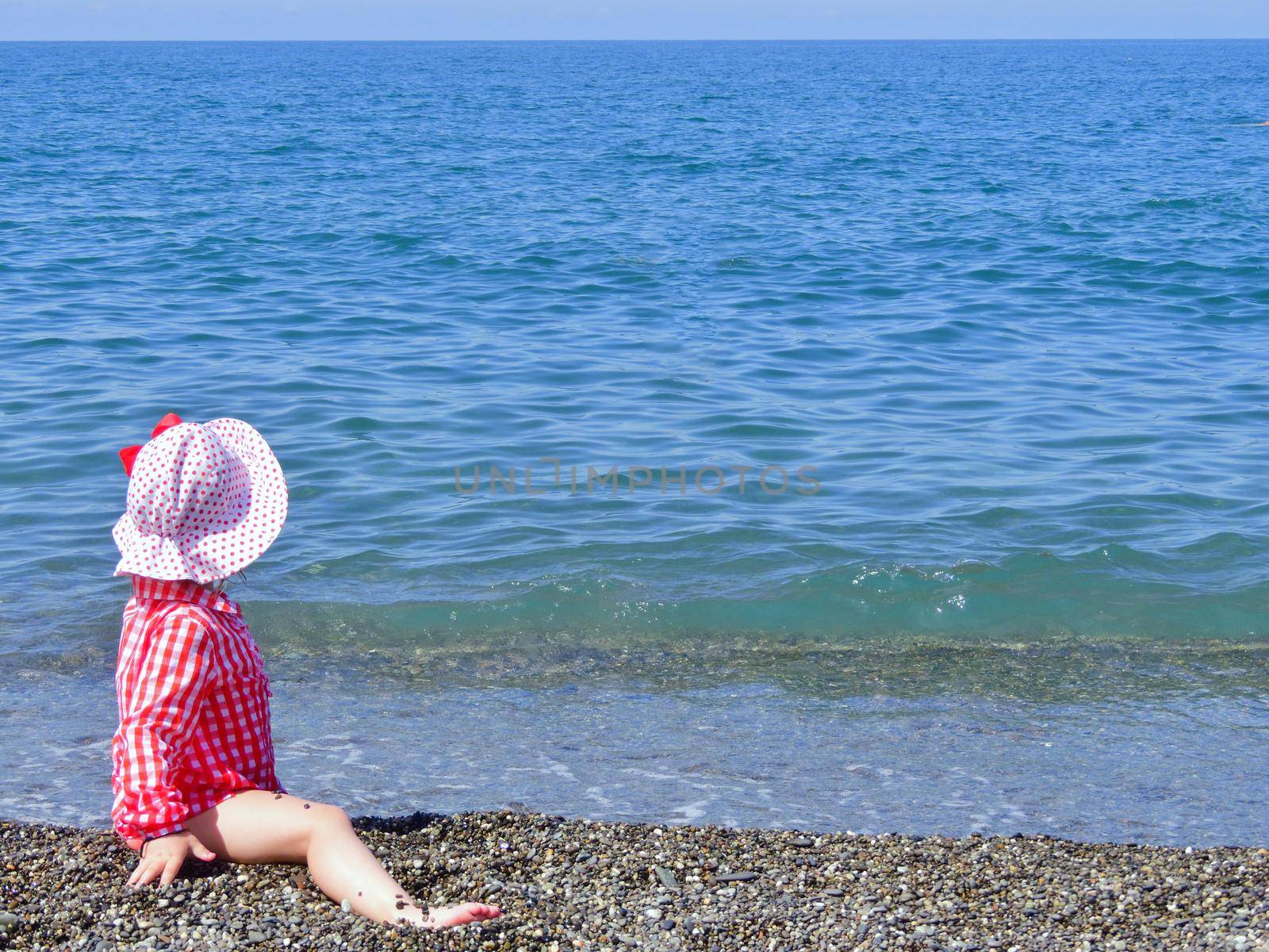 little girl on the beach by roman112007