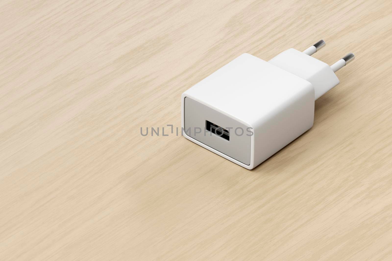 Smartphone, tablet or other electronic device charger with USB port on the wooden table