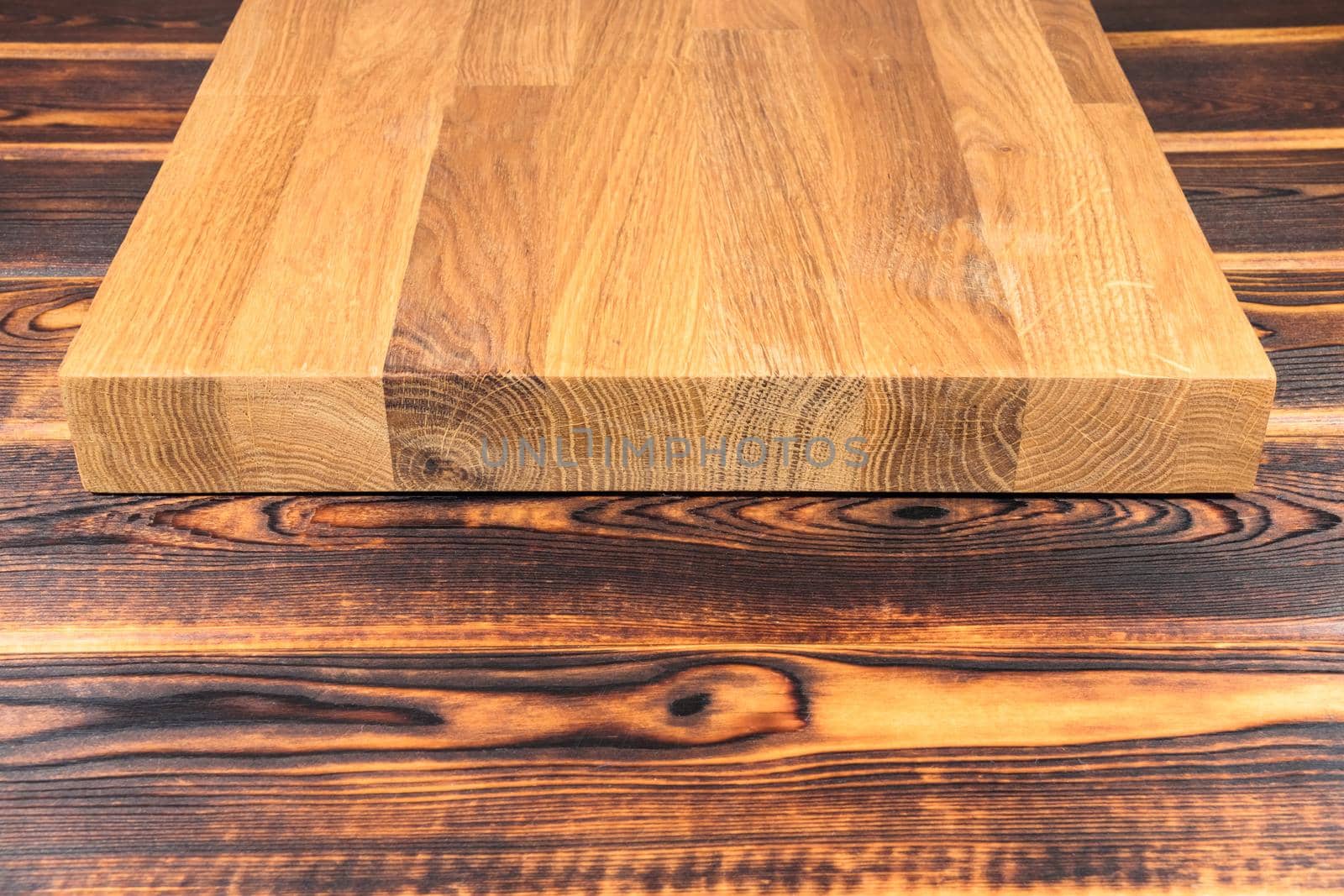 cutting Board on a wooden background top view by roman112007