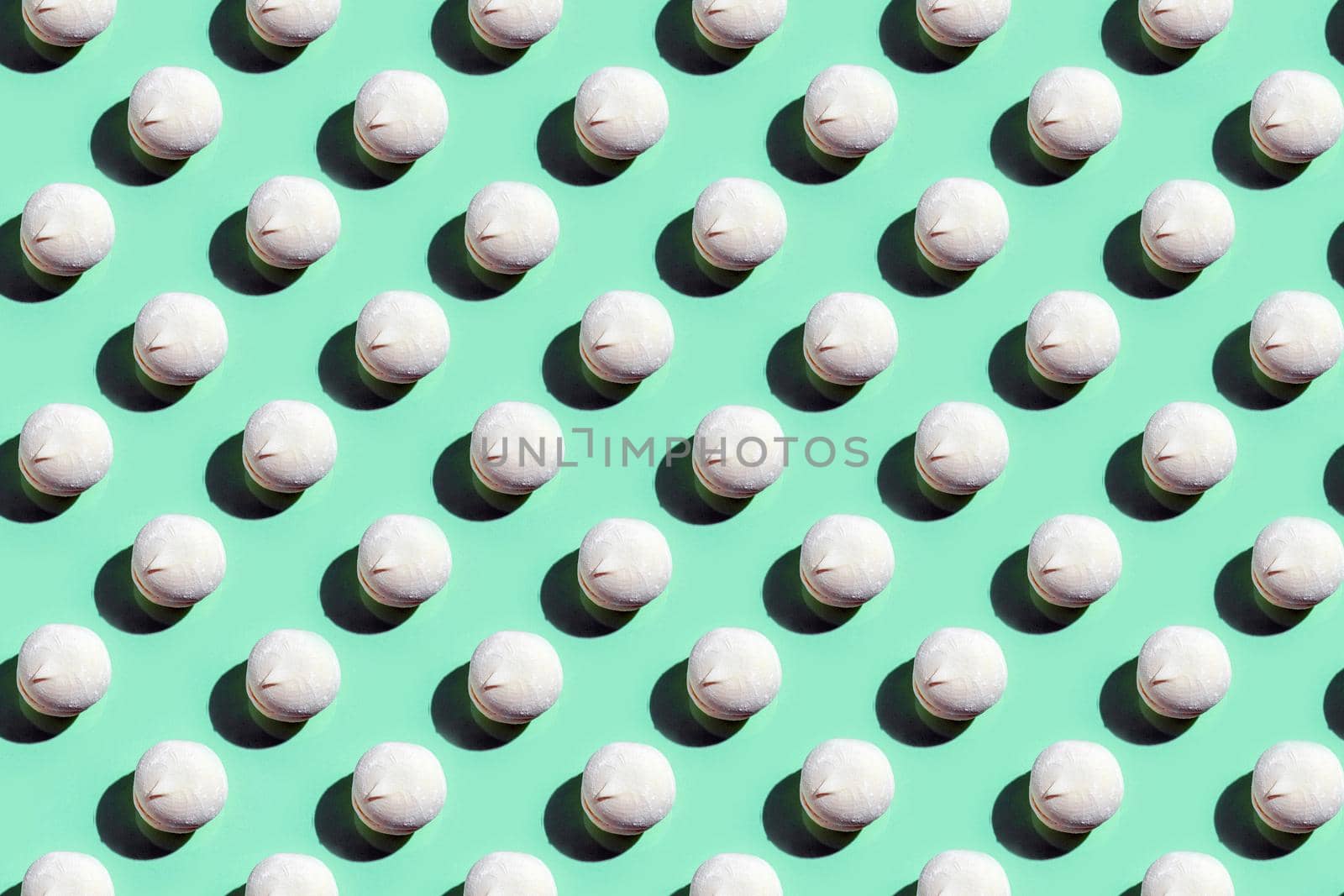 colorful marshmallow pattern on a colored background top view. High quality photo