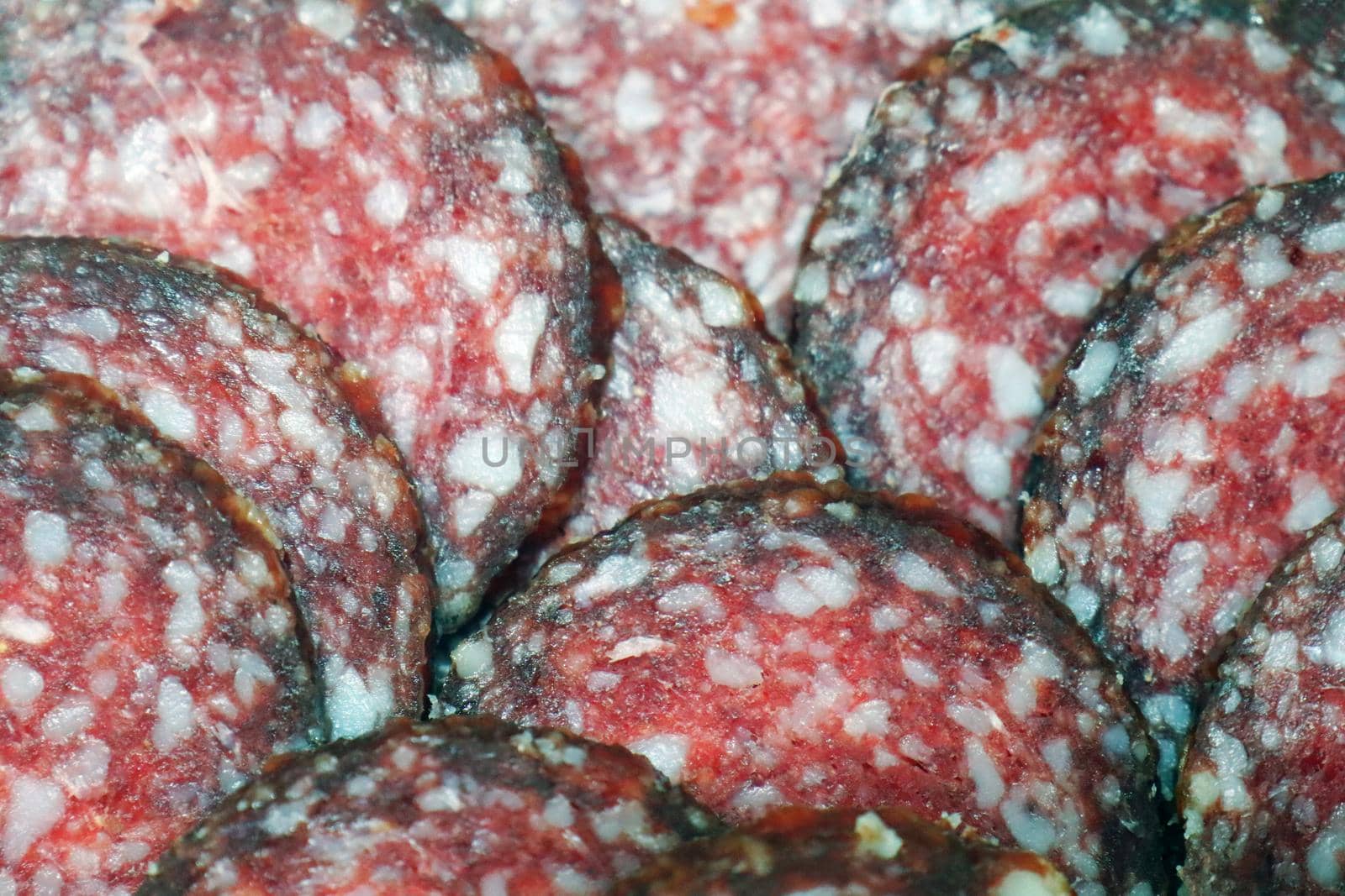 slicing smoked sausage for the entire frame macro