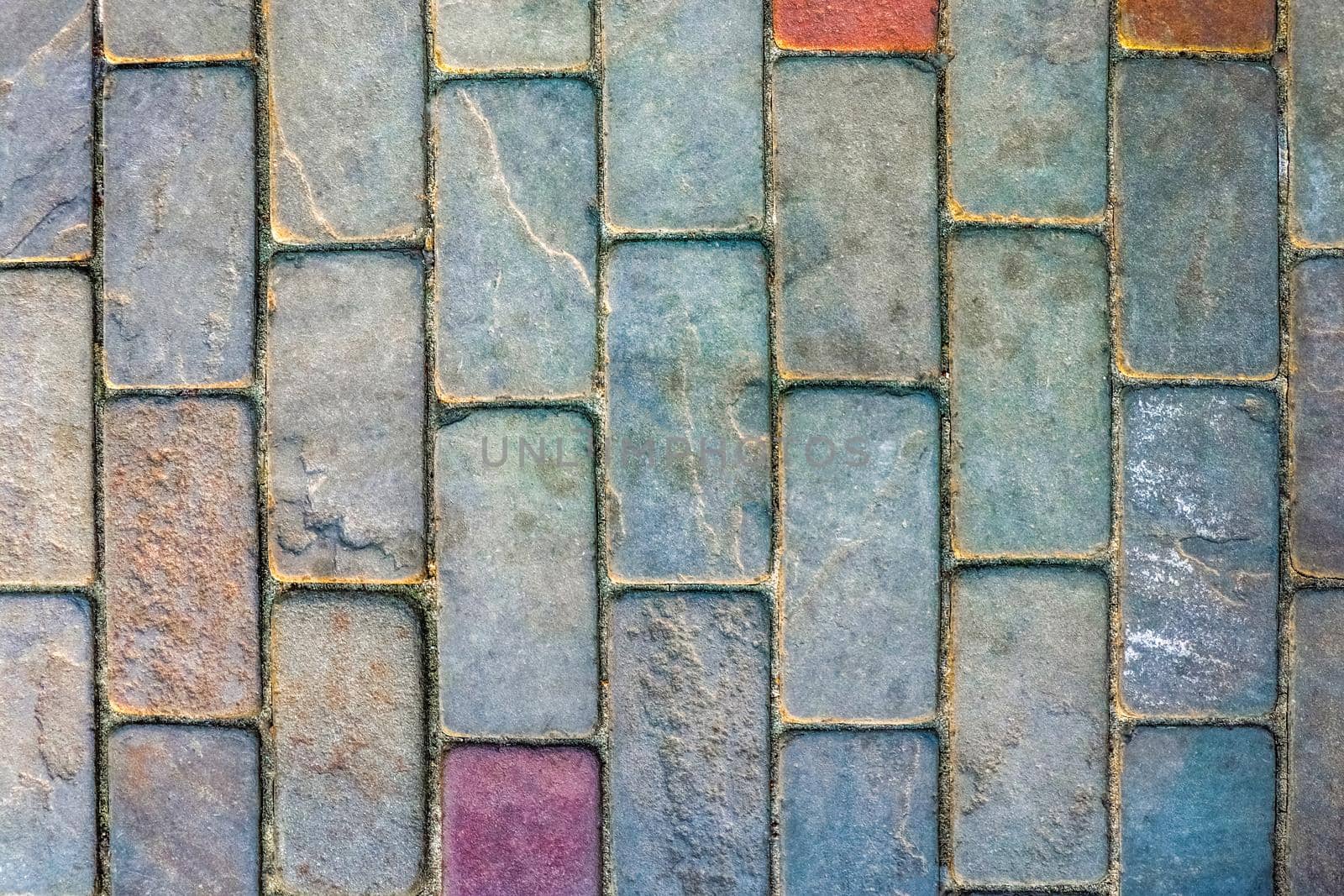 masonry wall paving stones as a background close up